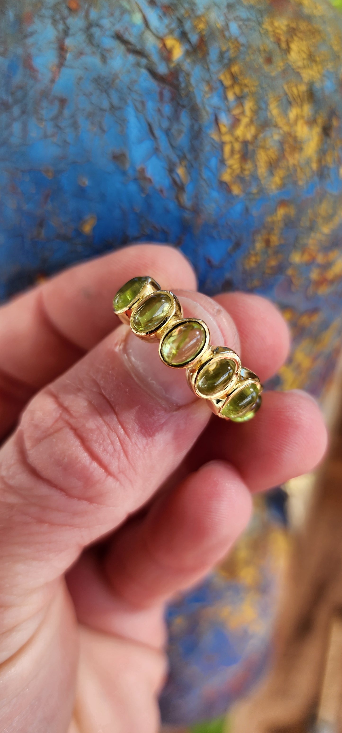 Absolutely gorgeous handmade Sterling Silver and 22ct Yellow Gold plated Peridot Cabochons Full Eternity ring.Bezel/tube set with 12x Oval Peridot Cabochons forming a perfect Circle of Candy to adorn your hand .Perfectly unisex and a fabulous stacker!