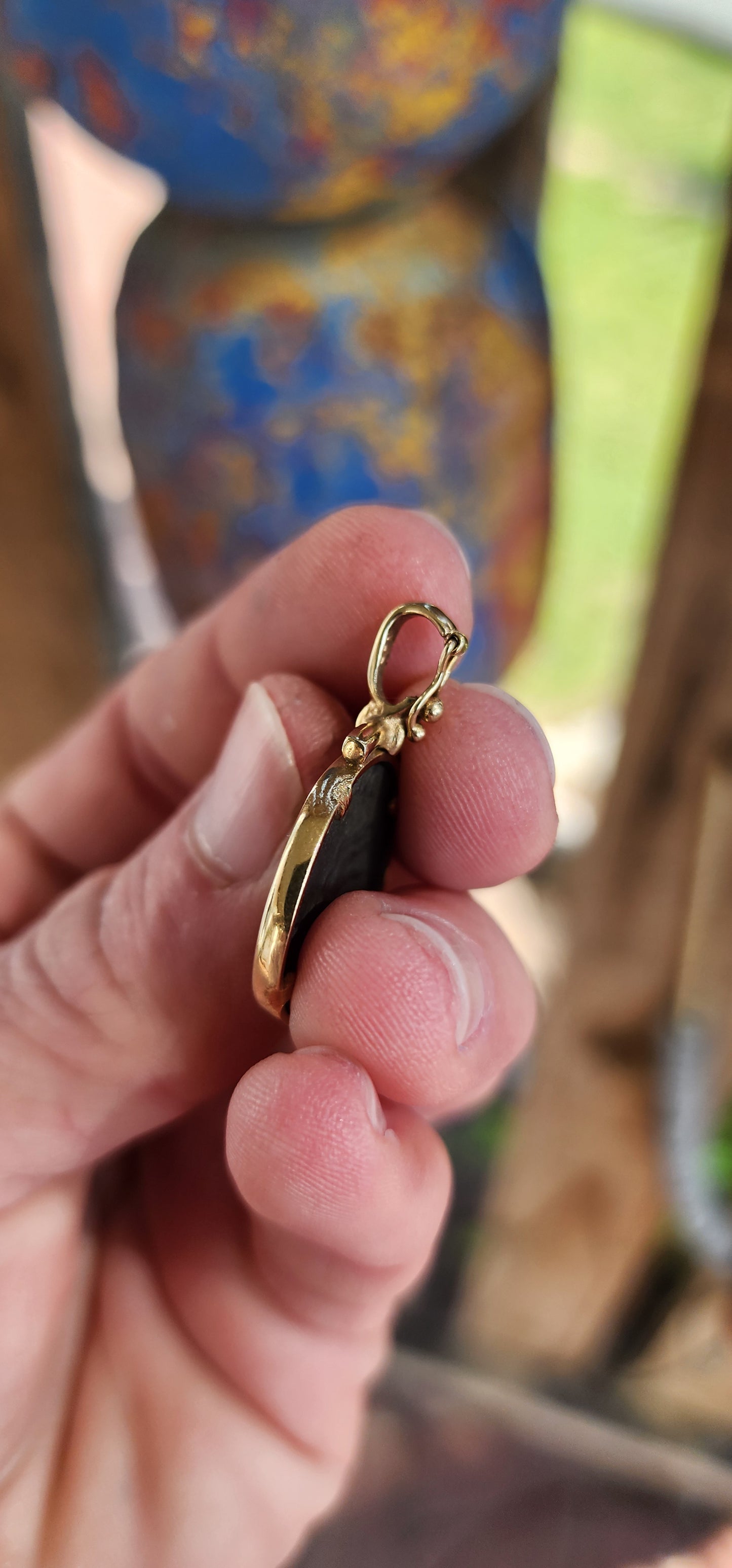 A fabulous Ancient Roman Bronze coin pendant featuring Postumus Antoninianus in a 8ct Yellow Gold bezel with open/close bail.
This pendant features a true Ancient Roman Bronze coin that was lightly circulated and depicts Postumus Antoninianus 260-269 AD.