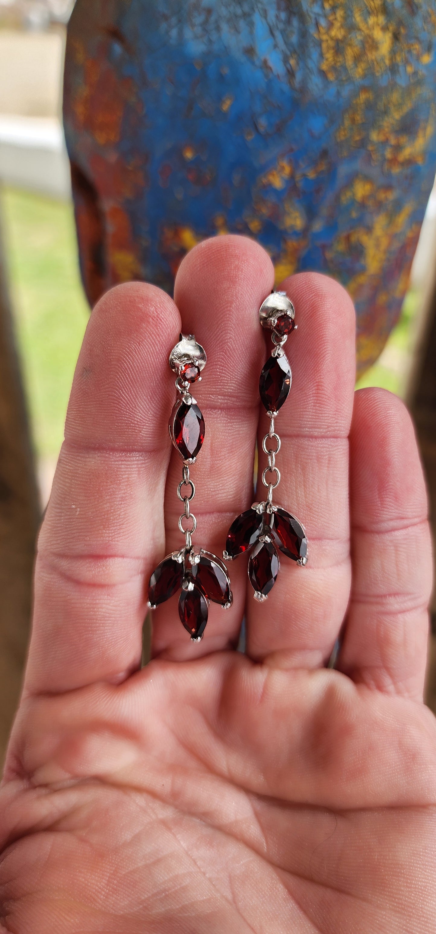 Pleasing pair of Sterling Silver and Marquise cut Garnet Gemstones dangle/drop push-in earrings.