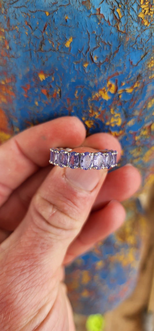 Absolutely gorgeous Sterling Silver and Tanzanite Gemstones Full Eternity ring.