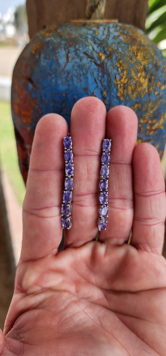 Stunning pair of Sterling Silver and Tanzanite Gemstones Articulated drop earrings.