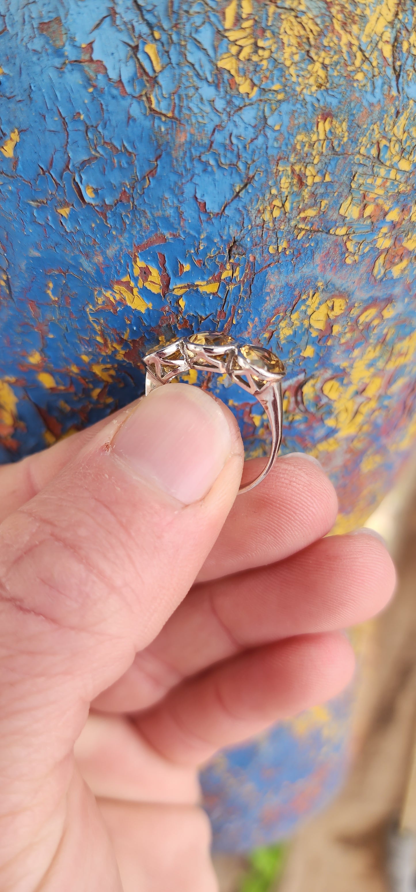 Gorgeous Sterling Silver and Yellow Citrine Gemstones Trilogy ring .This exquisite ring features three Round faceted cut Yellow Citrine Gemstones, bezel/tube set in pierced baskets.