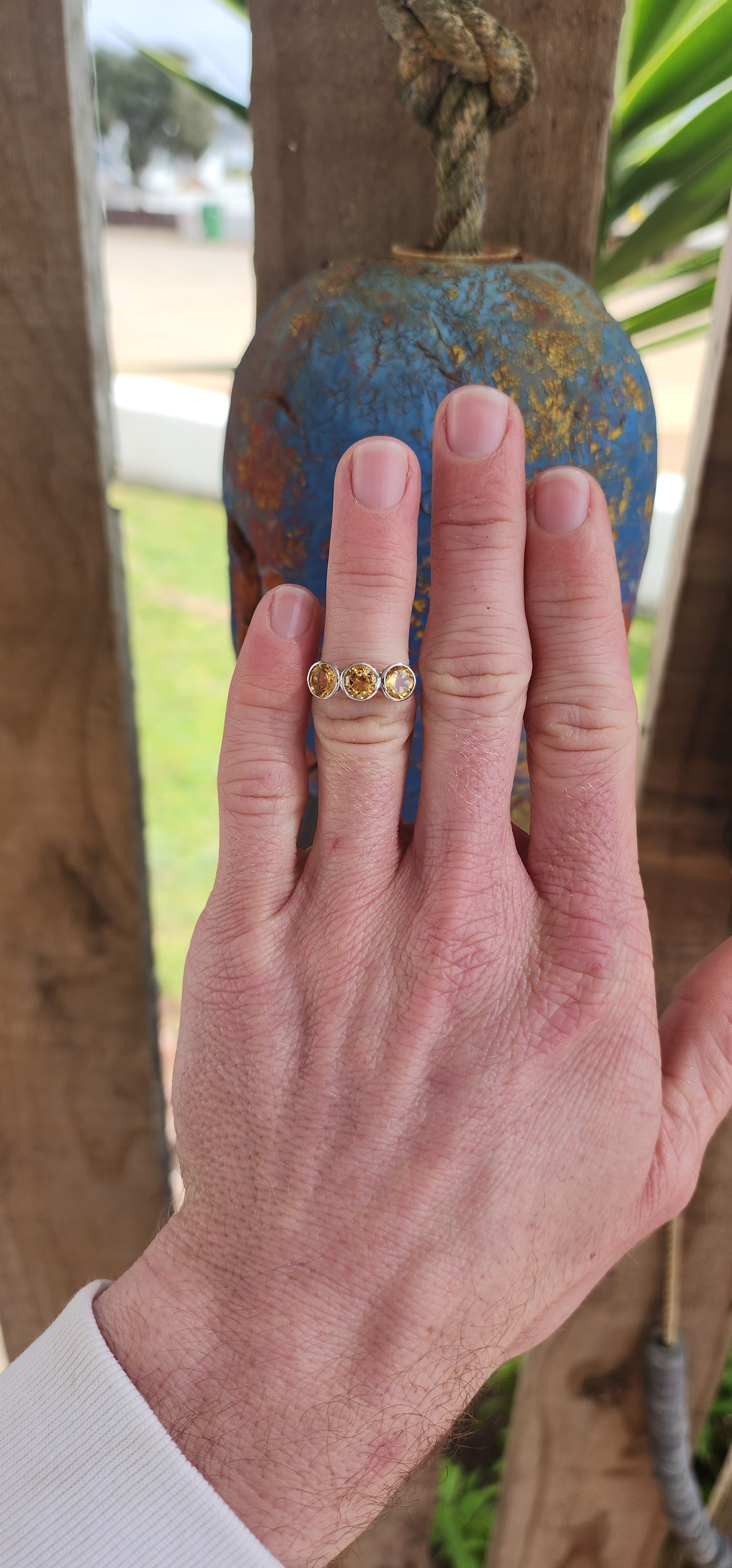 Gorgeous Sterling Silver and Yellow Citrine Gemstones Trilogy ring .This exquisite ring features three Round faceted cut Yellow Citrine Gemstones, bezel/tube set in pierced baskets.