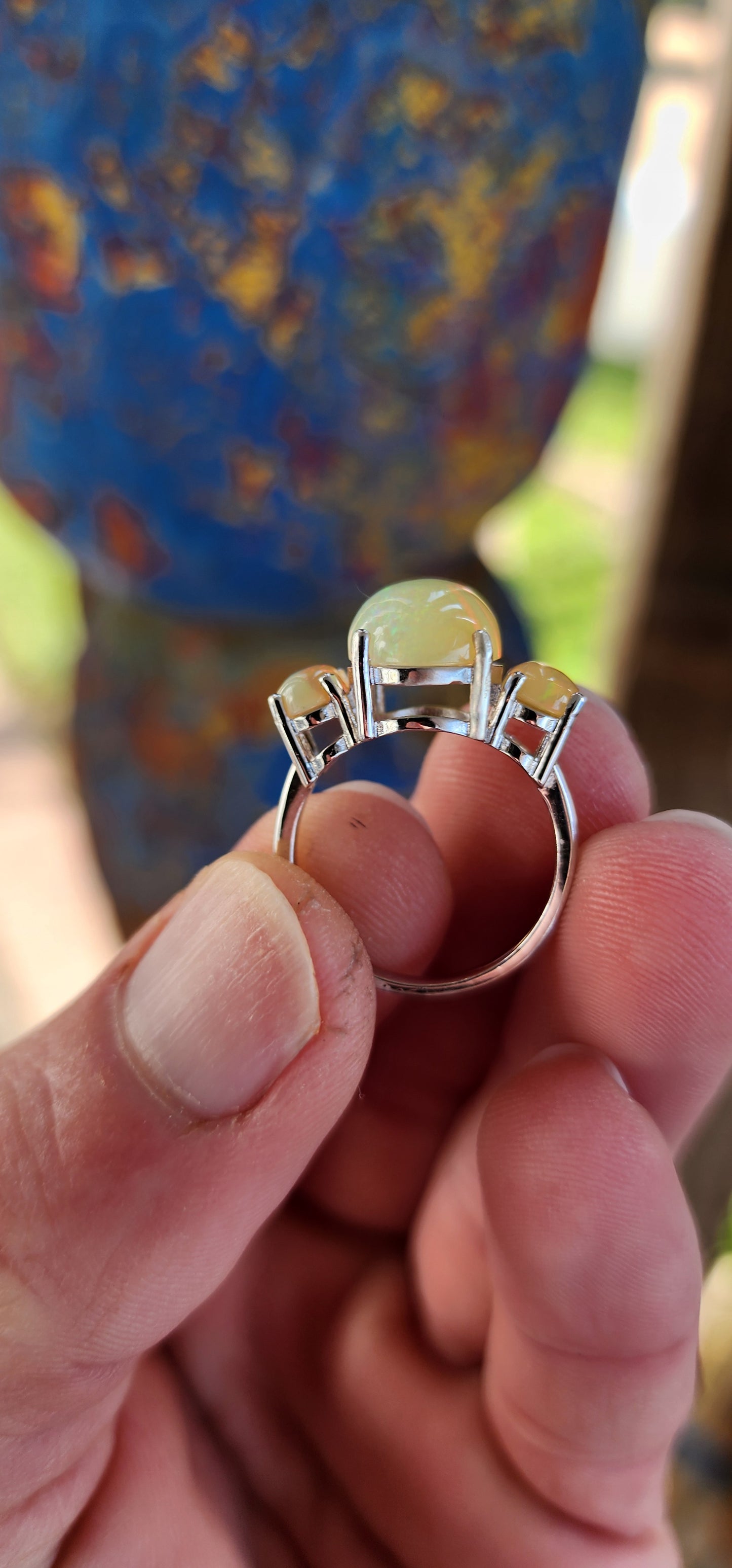 Marvelous Sterling Silver and Orange Ethiopian Welo Opal Cabochons Trilogy ring.This ring forms part of a matching set consisting out of Trilogy ring , earrings and pendant on chain .All Sold separately.