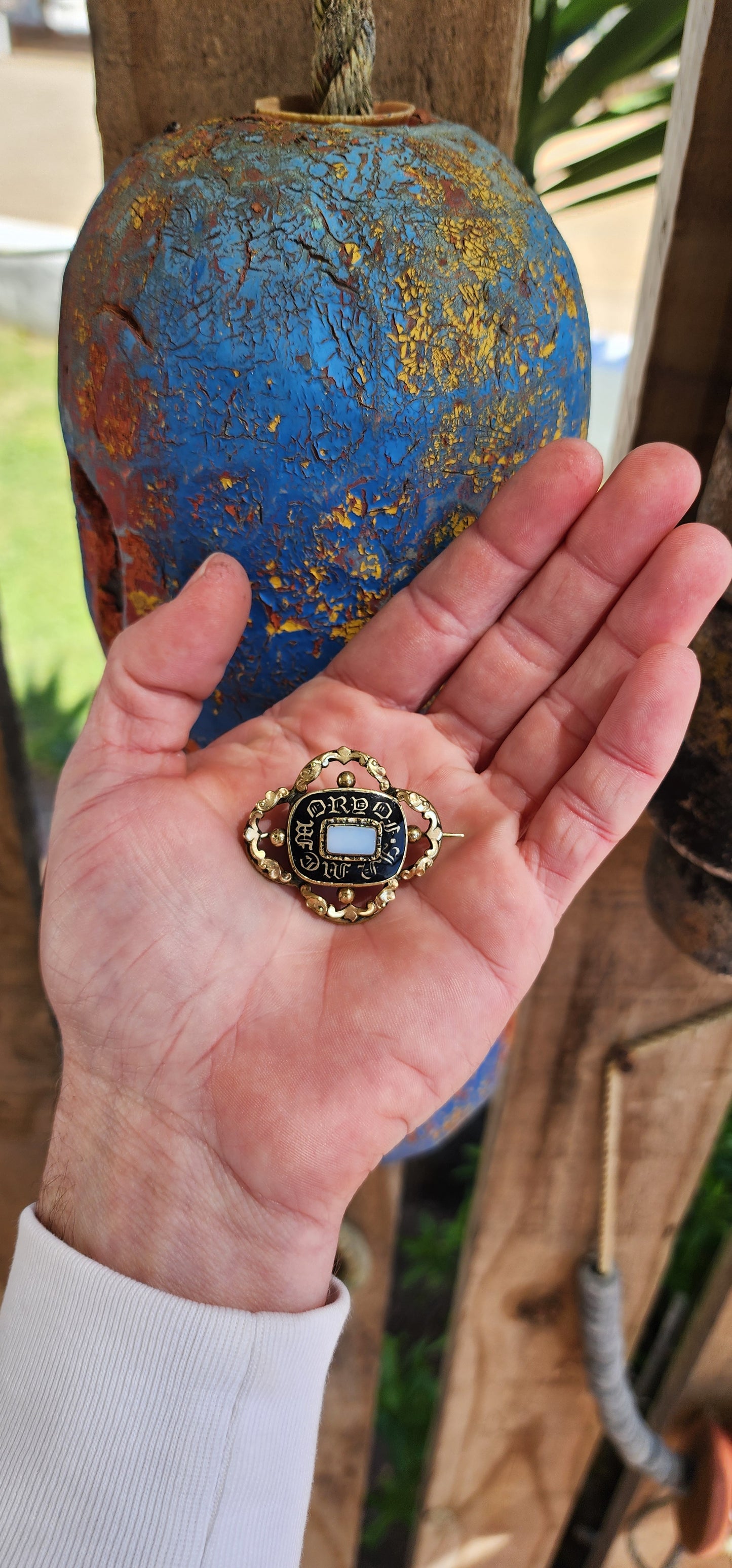 A poignant Antique Mourning brooch dating to the early years of the 19th century and in the Rococo style which was having a revival at the time.