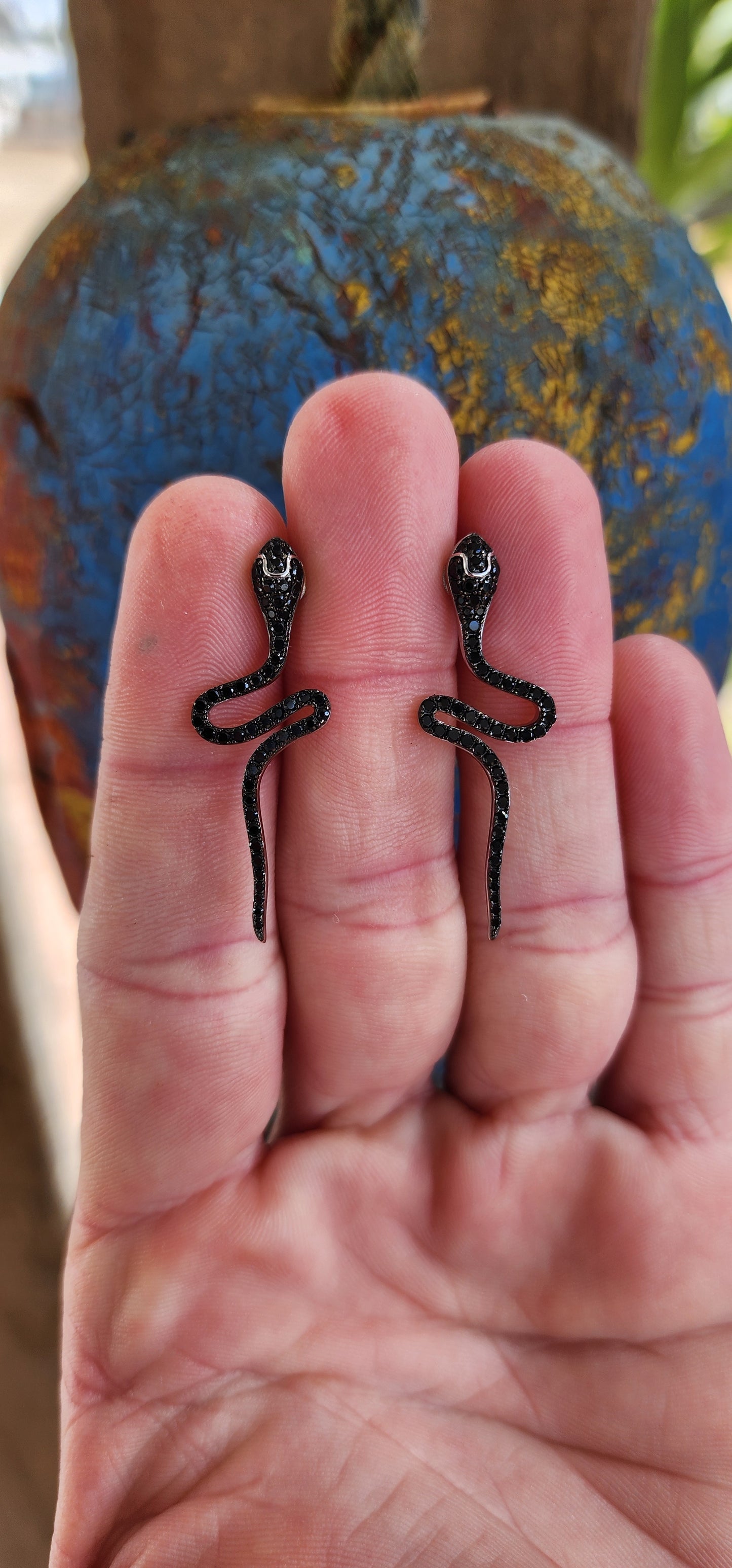 Magical and inimitable Sterling Silver Serpents push-in earrings.The Serpents are adorned with pave Black Spinel Gemstones, adding a magical sparkle to their eyes and body.