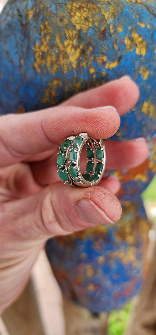 Gorgeous pair of Sterling Silver and Natural Green Emerald Gemstones Huggies/Hoop earrings .Each earring set with 6x Oval Faceted Cut Green Emeralds.