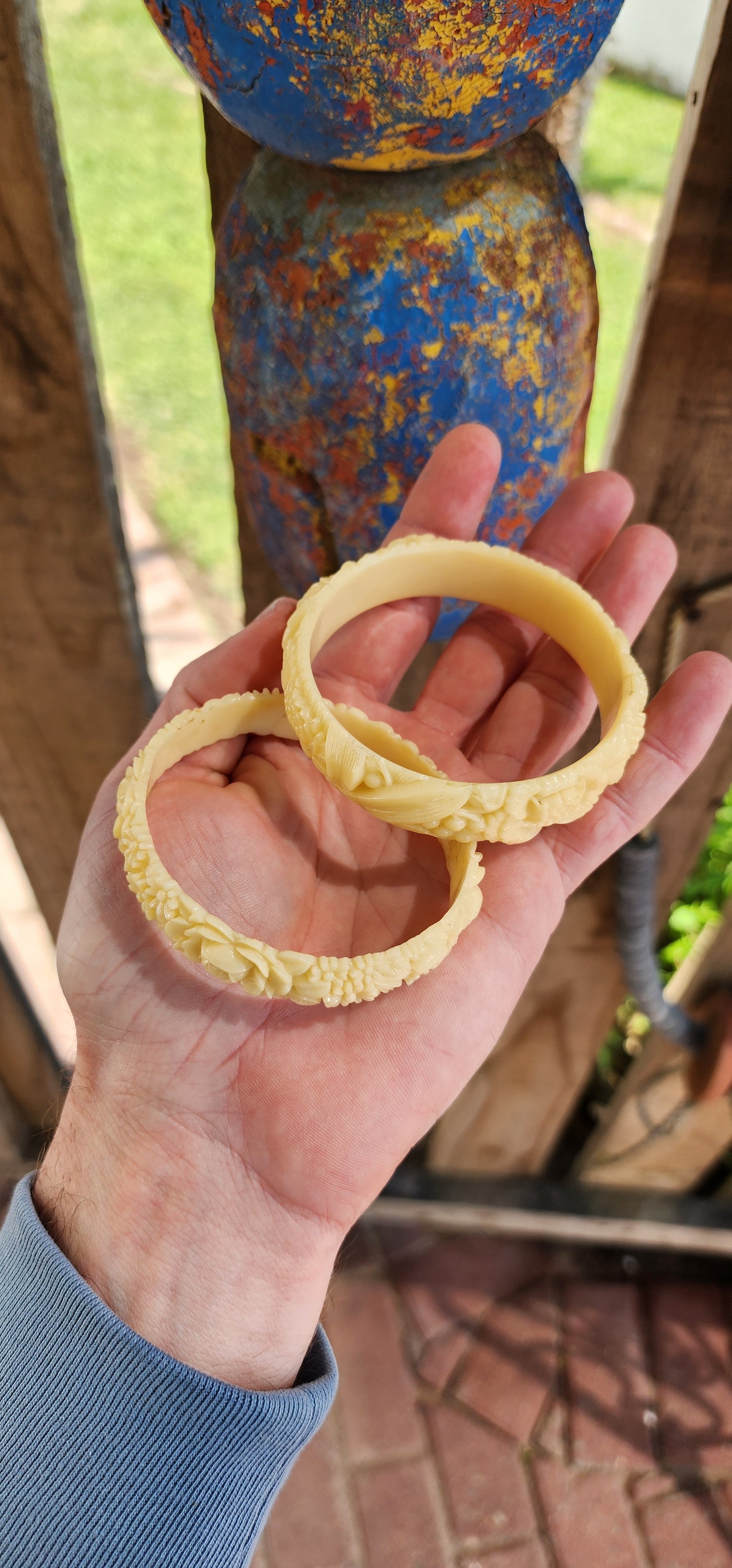 Gorgeous pair of two Vintage 1930/40's Cream deeply moulded Celluloid bangles with embossed florals.