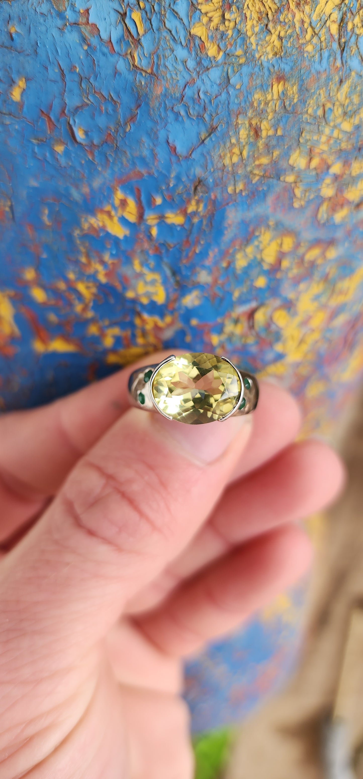 A fantastic Lemon Quartz Color is the perfect embodiment of Spring in this ring. This lovely Sterling ring showcases a Solitaire style with a Oval faceted cut and Channel set Lemon Quartz Gemstone in the centre.