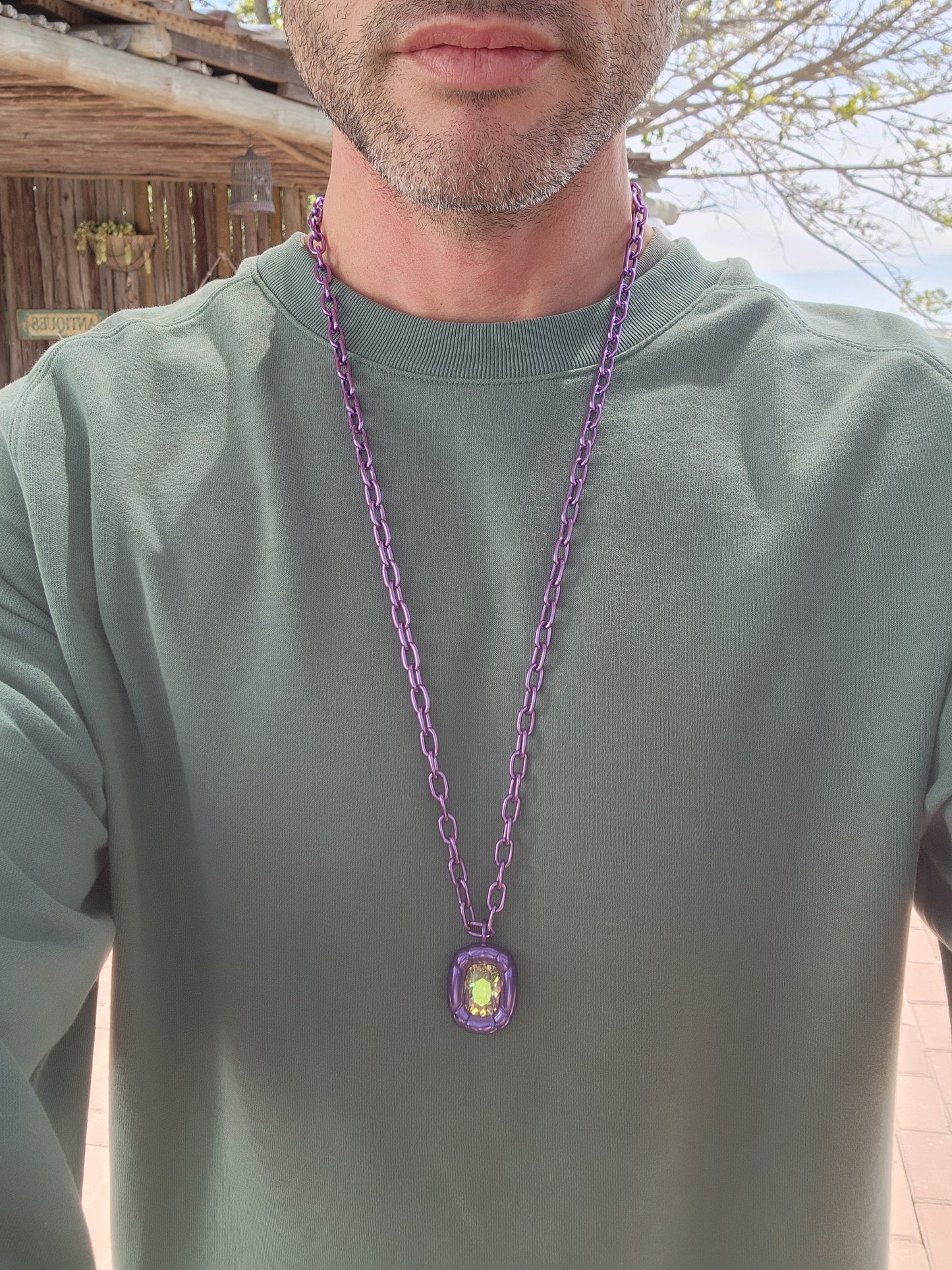 Authentic Swarovski "Dulcis" pendant on chain.
This fun pendant necklace is inspired by sculptures from the Pop Art era, made with a single precision cut Yellowish/Brown Swarovski Crystal Cushioned in a glossy Violet molded setting.