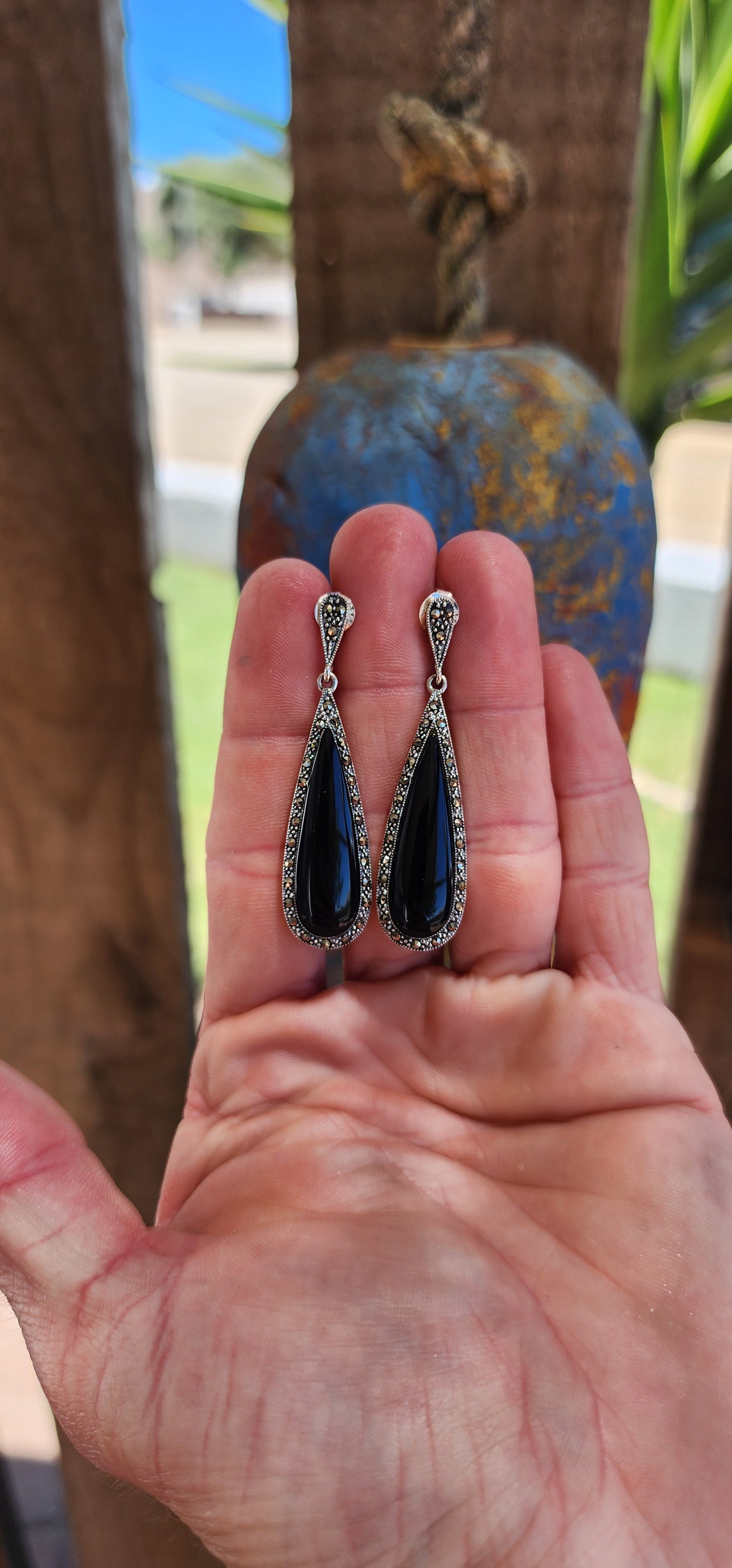 Elegant pair of Art Deco Inspired Sterling Silver,Onyx and Marcasites push-in drop earrings.
Each earring set with 1x large Teardrop cut Onyx Cabochon framed in a sparkly Marcasite halo.