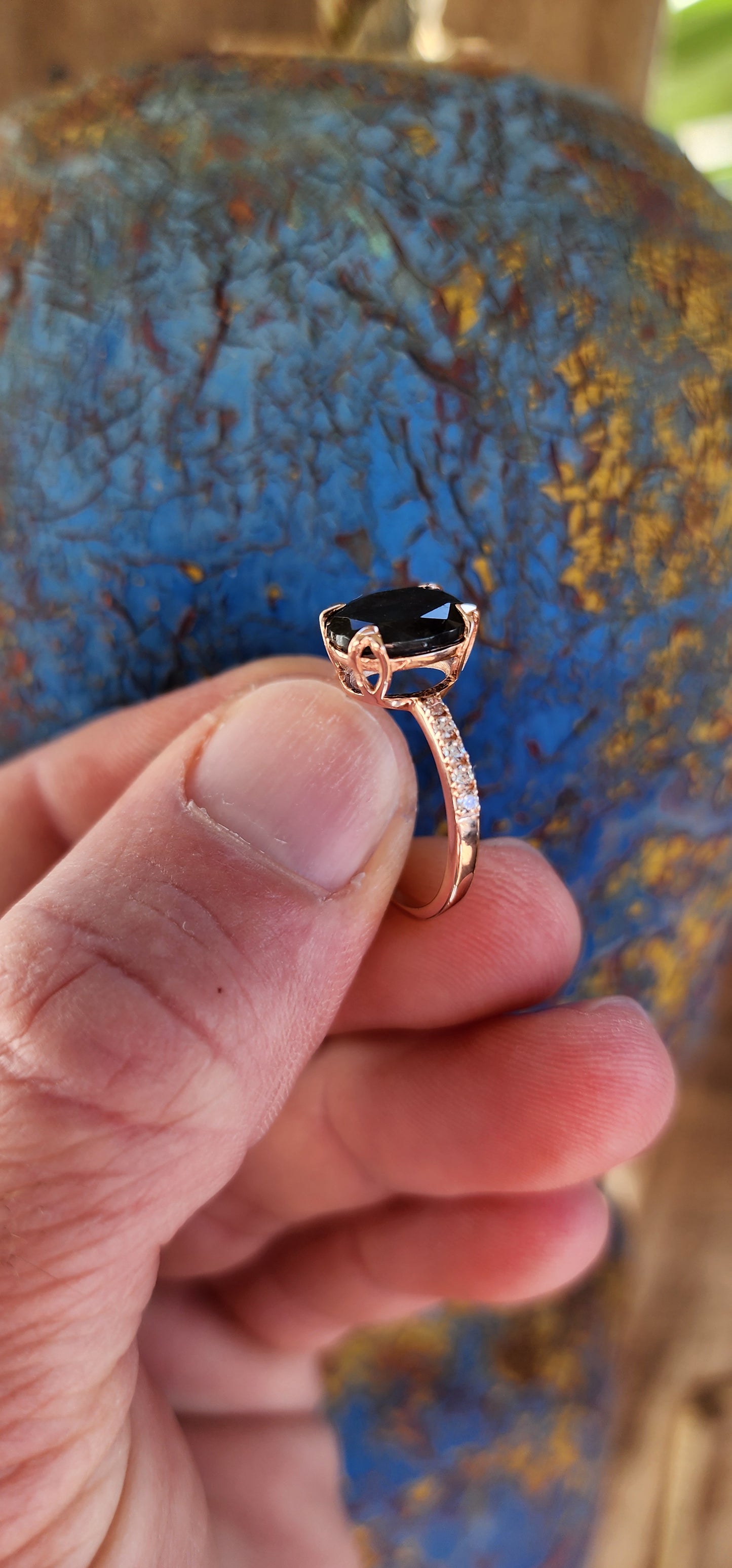 This ring is the ultimate combination of elegance and mystique! The shimmering sterling silver band, delicately plated with Rose Gold, cradles a stunning oval-cut Labradorite gemstone, known for its captivating, otherworldly flashes of color.