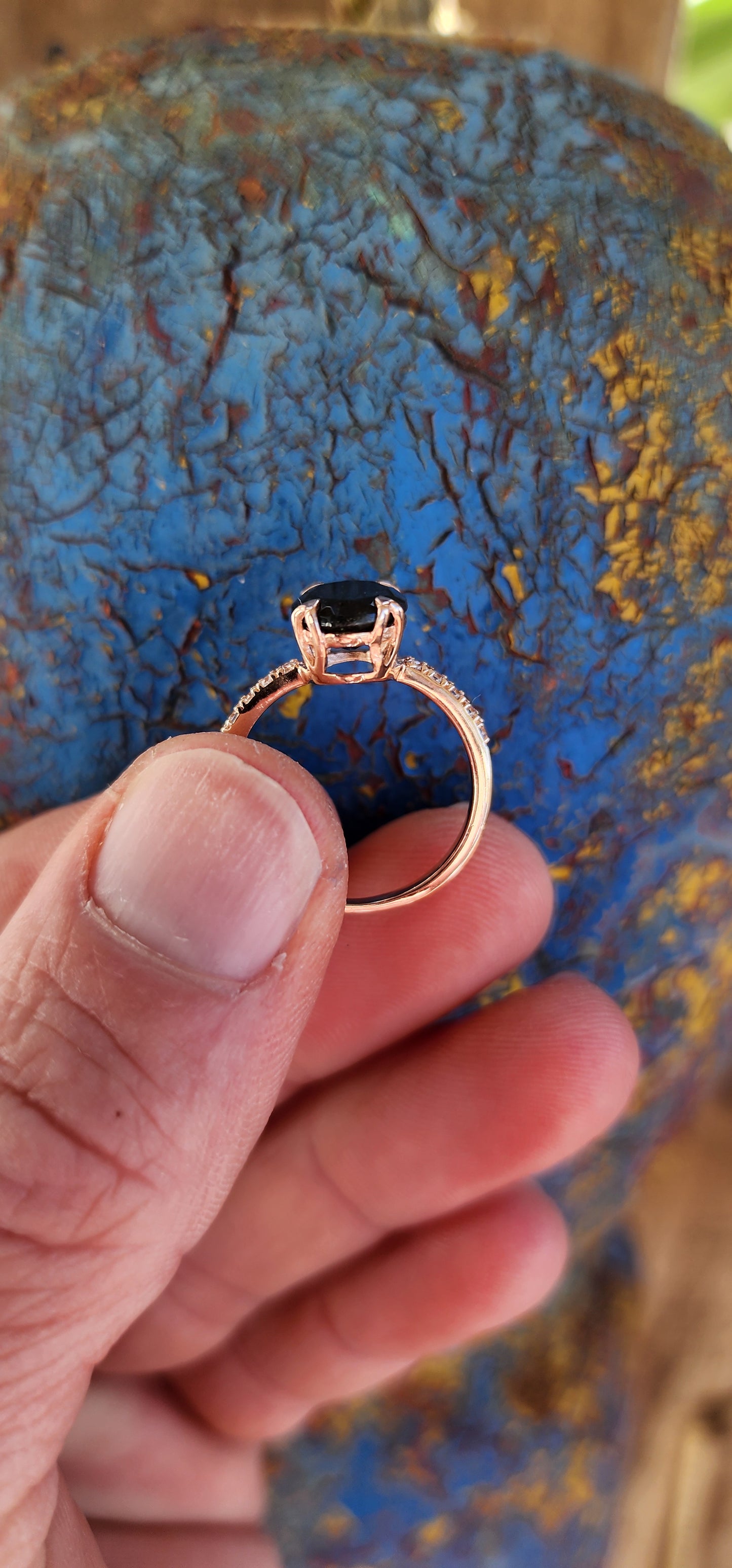 This ring is the ultimate combination of elegance and mystique! The shimmering sterling silver band, delicately plated with Rose Gold, cradles a stunning oval-cut Labradorite gemstone, known for its captivating, otherworldly flashes of color.