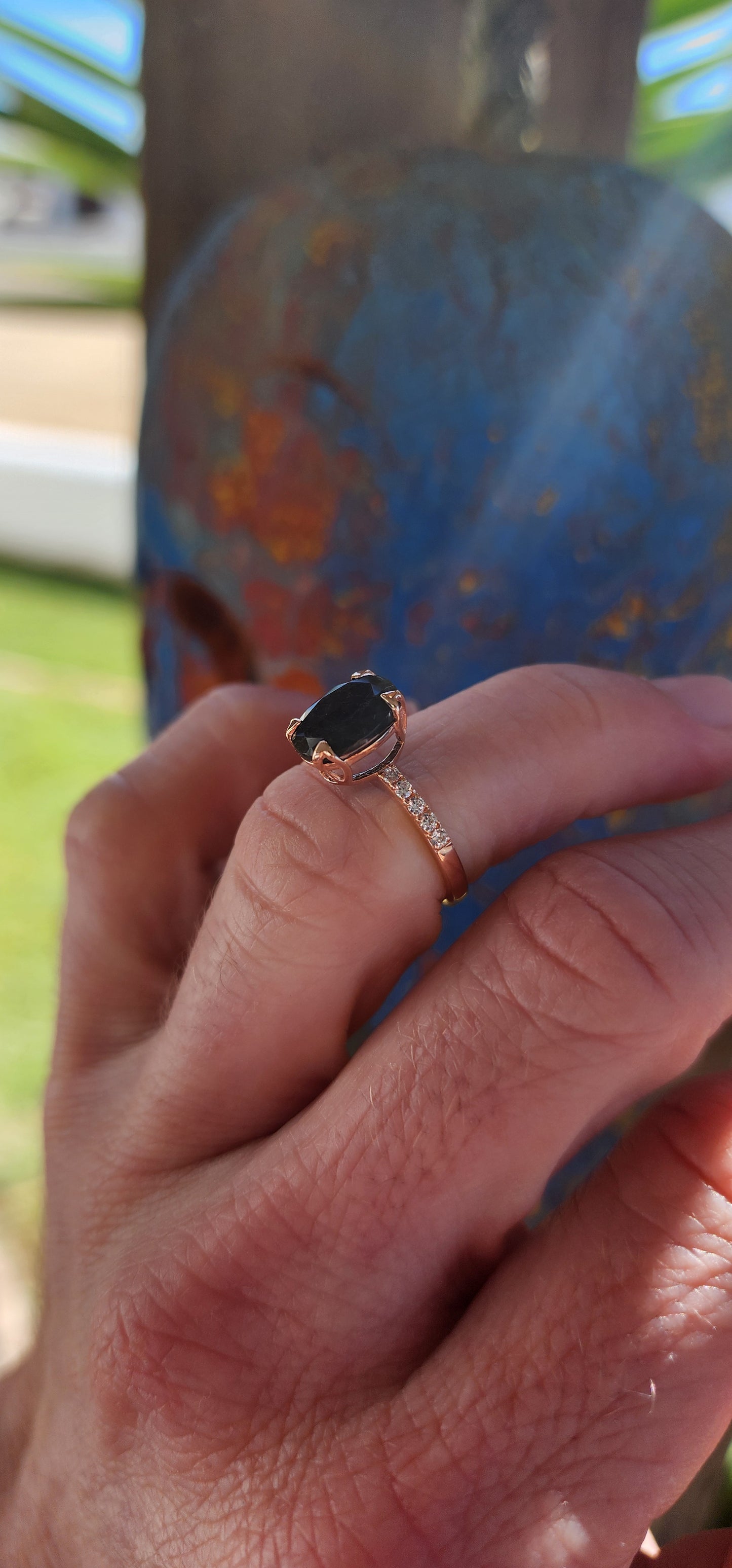 This ring is the ultimate combination of elegance and mystique! The shimmering sterling silver band, delicately plated with Rose Gold, cradles a stunning oval-cut Labradorite gemstone, known for its captivating, otherworldly flashes of color.