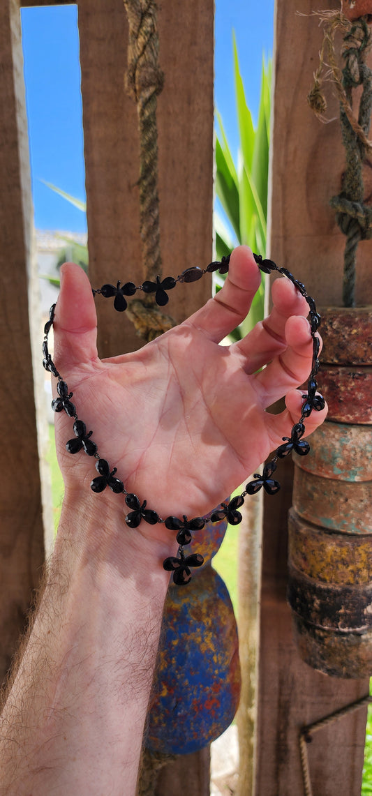 Antique Victorian circa 1880's French Jet trefoil Riviere style necklace with pendant.
This necklace is an exquisite example of Victorian mourning jewelry, specifically from the 1880s.