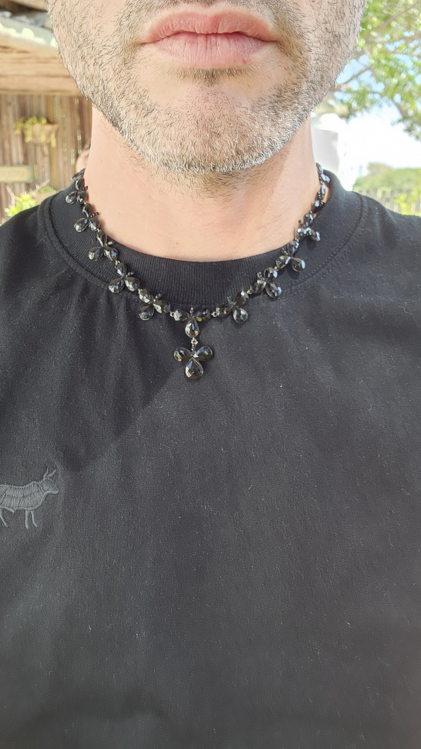 Antique Victorian circa 1880's French Jet trefoil Riviere style necklace with pendant.
This necklace is an exquisite example of Victorian mourning jewelry, specifically from the 1880s.