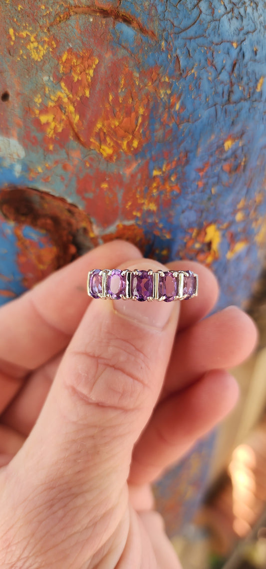 Beautiful Sterling Silver and Amethyst gemstones half-eternity ring.