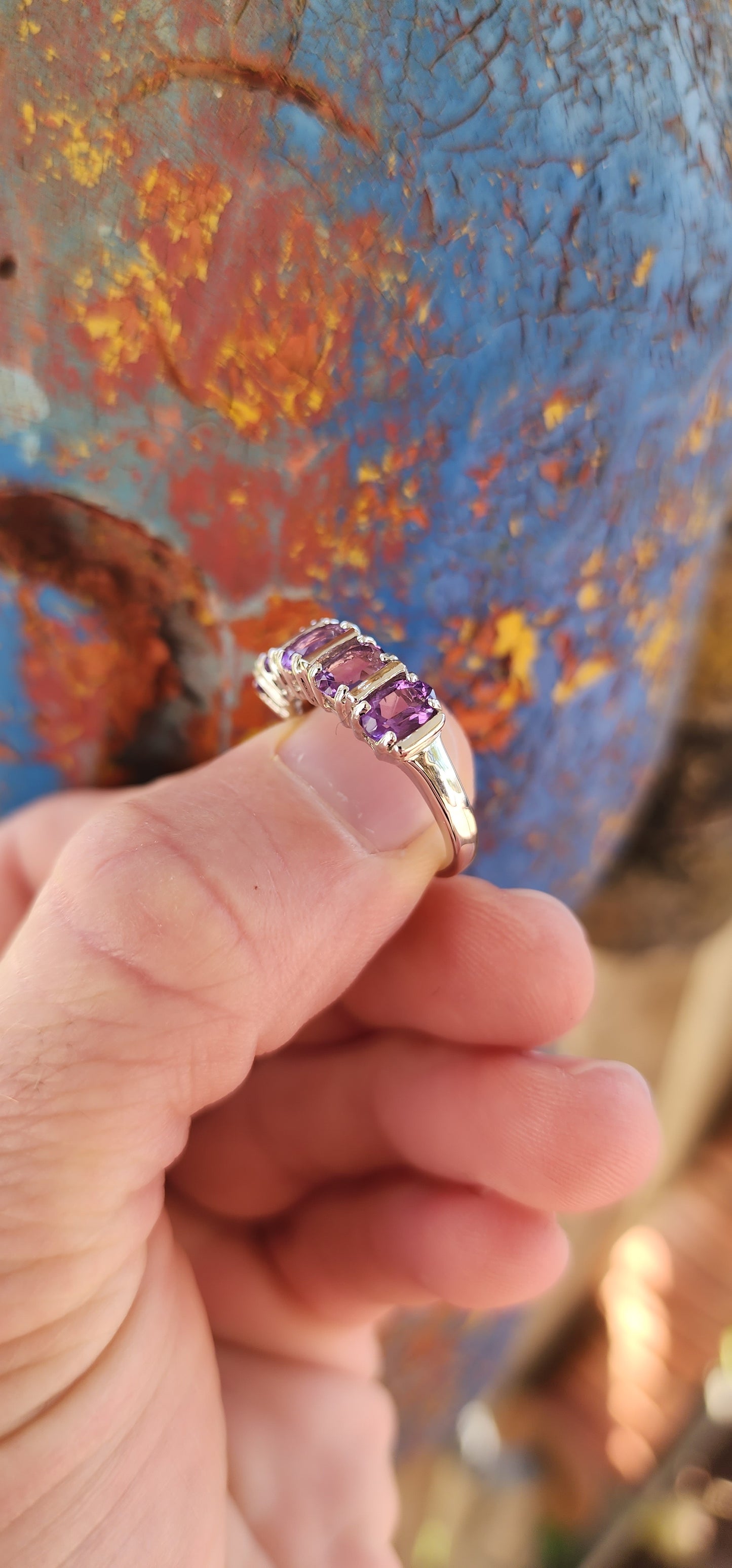 Beautiful Sterling Silver and Amethyst gemstones half-eternity ring.