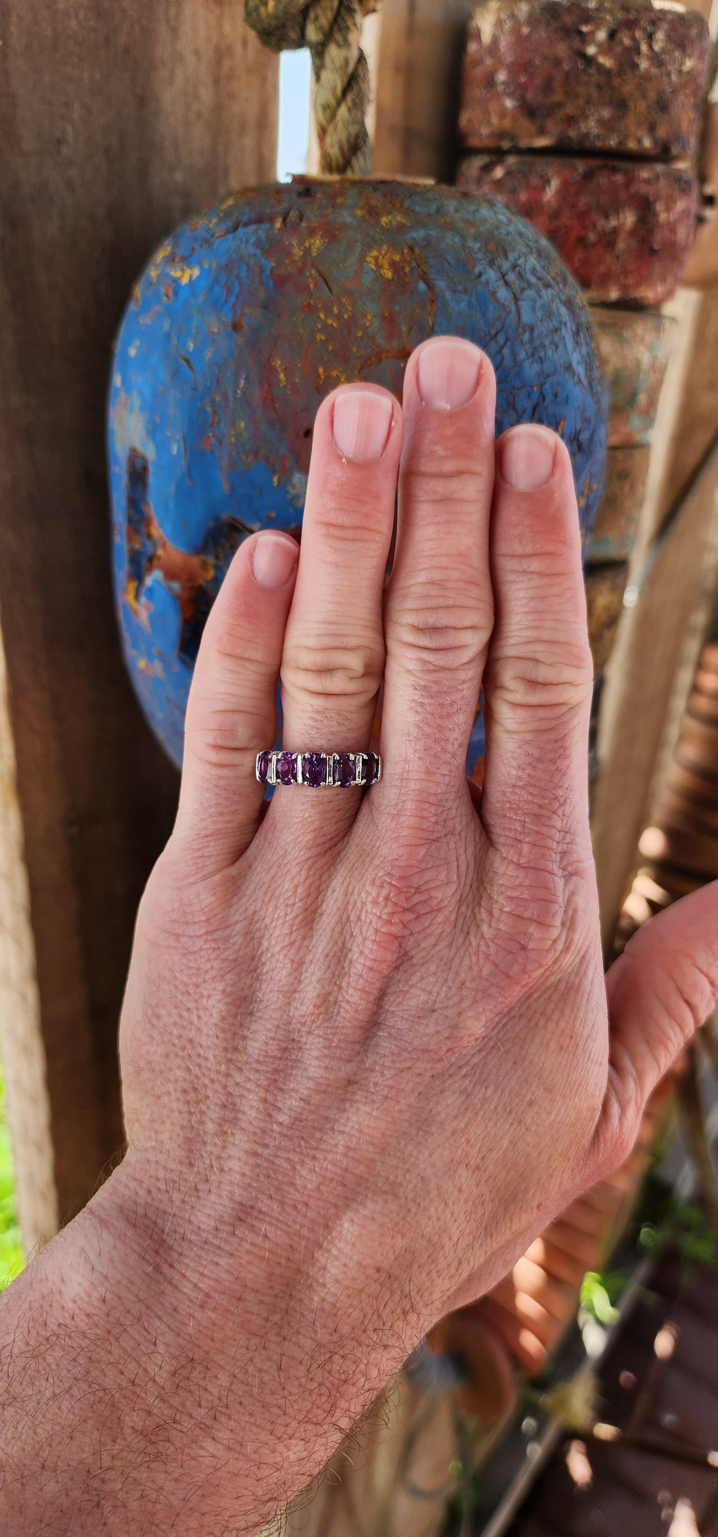 Beautiful Sterling Silver and Amethyst gemstones half-eternity ring.