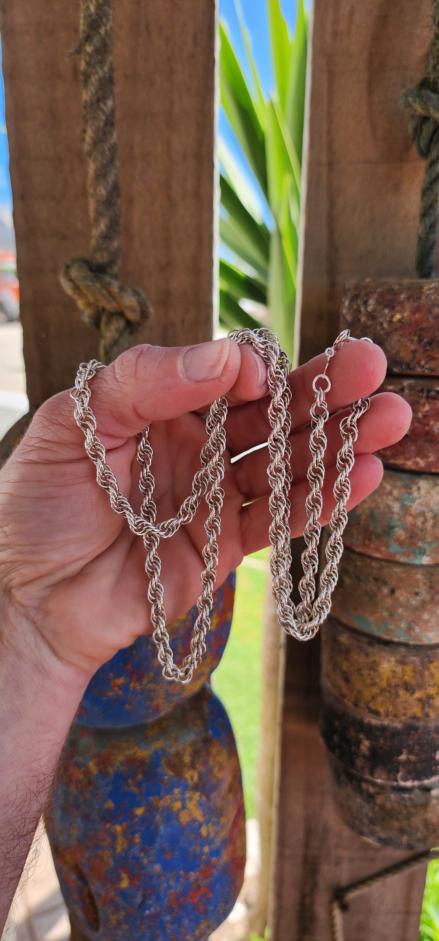 This Vintage necklace features a substantial, weighty Sterling Silver twisted rope chain design, giving it both a bold look and a luxurious feel.