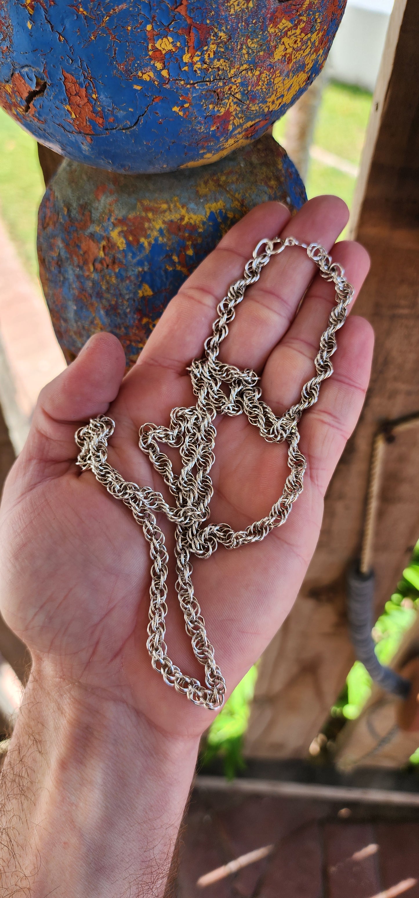 This Vintage necklace features a substantial, weighty Sterling Silver twisted rope chain design, giving it both a bold look and a luxurious feel.