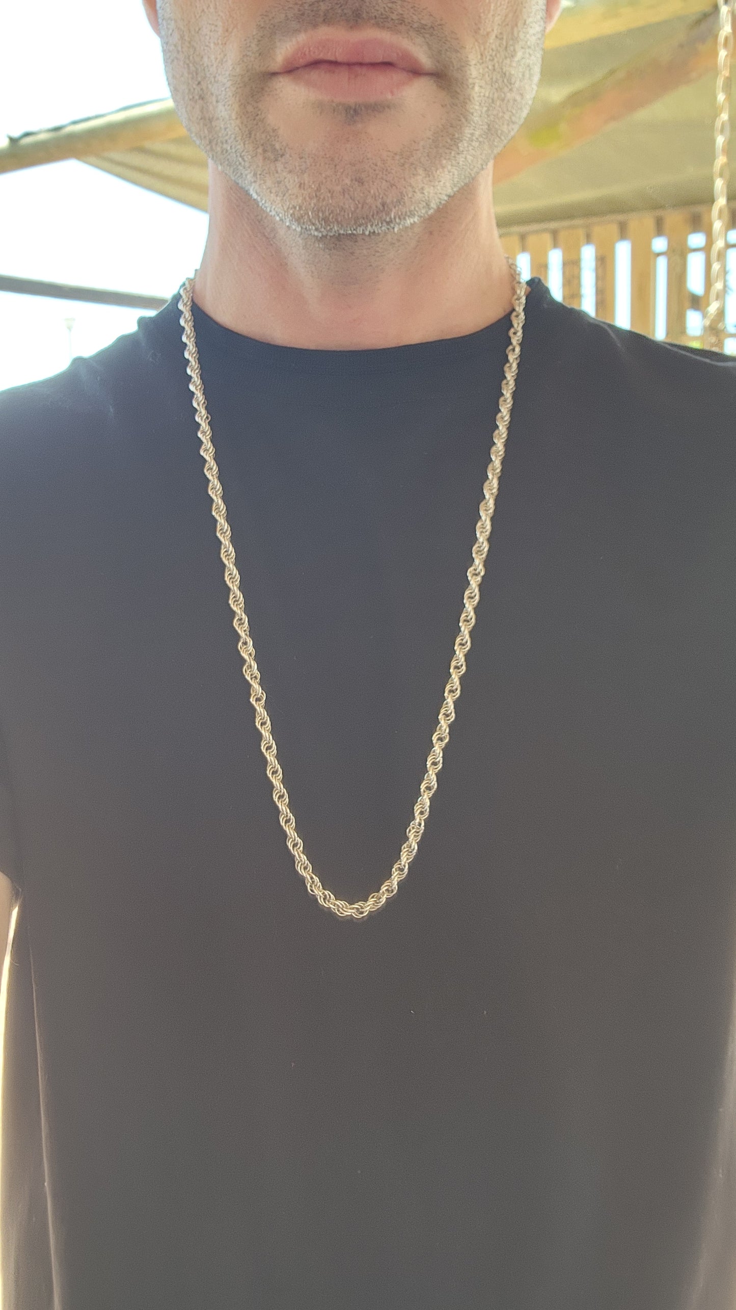 This Vintage necklace features a substantial, weighty Sterling Silver twisted rope chain design, giving it both a bold look and a luxurious feel.