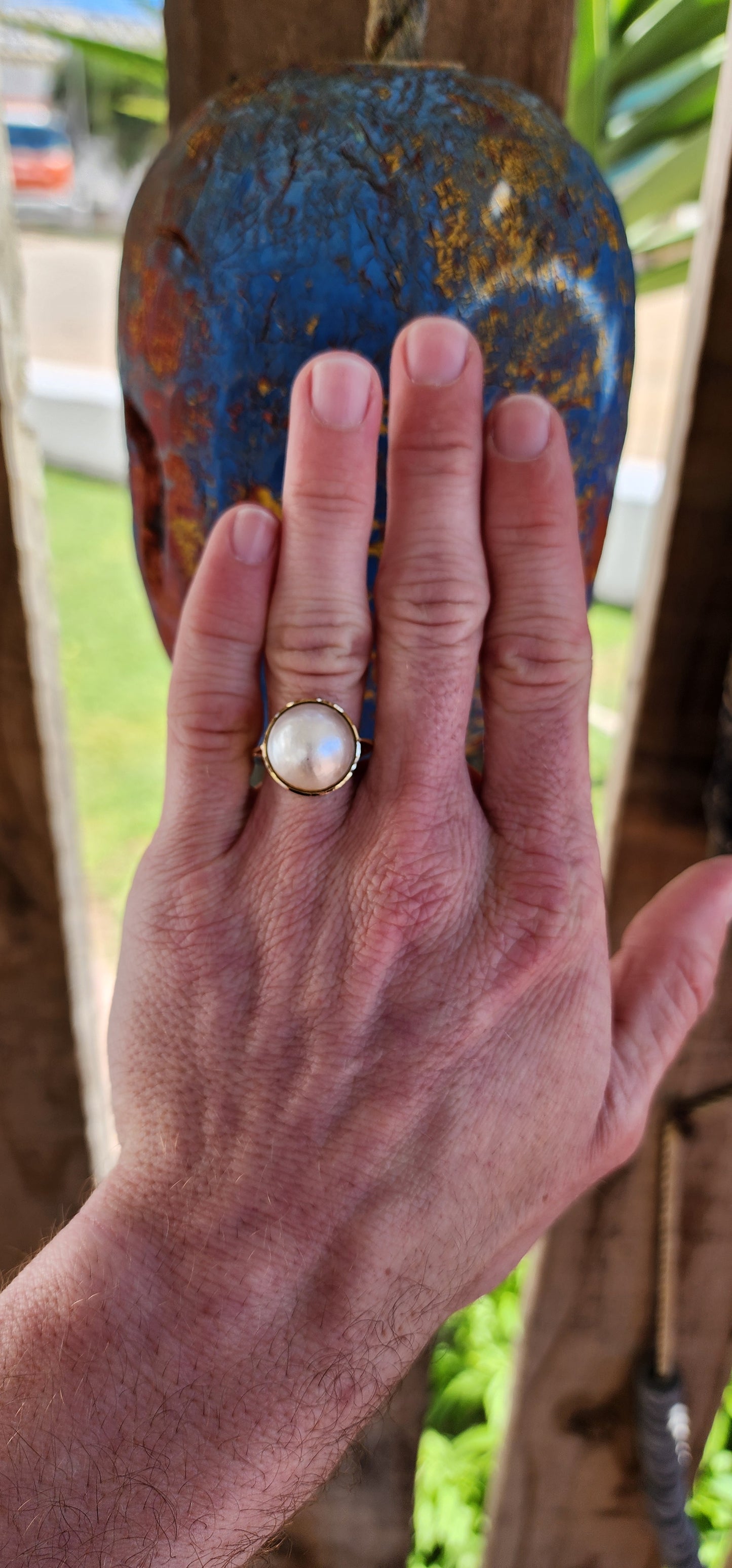 Stunning Vintage ring crafted in 9ct yellow gold, featuring a bezel tube setting that holds a large Mabe Pearl.