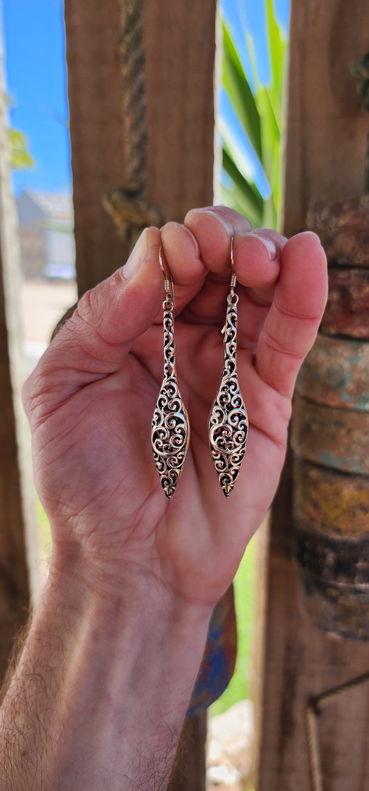 Gorgeous pair of double-sided Sterling Silver drop earrings with a beautiful bohemian aesthetic.