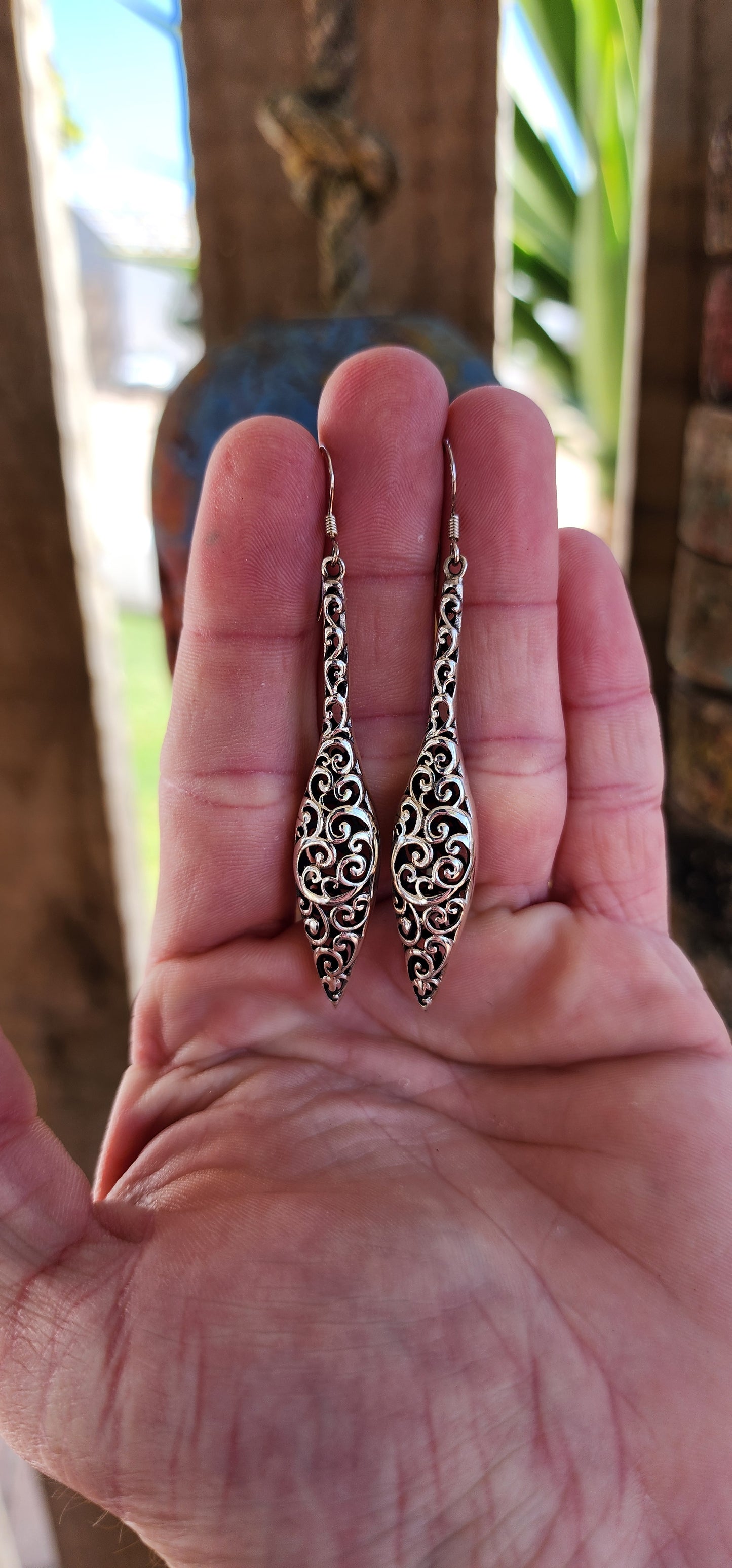 Gorgeous pair of double-sided Sterling Silver drop earrings with a beautiful bohemian aesthetic.