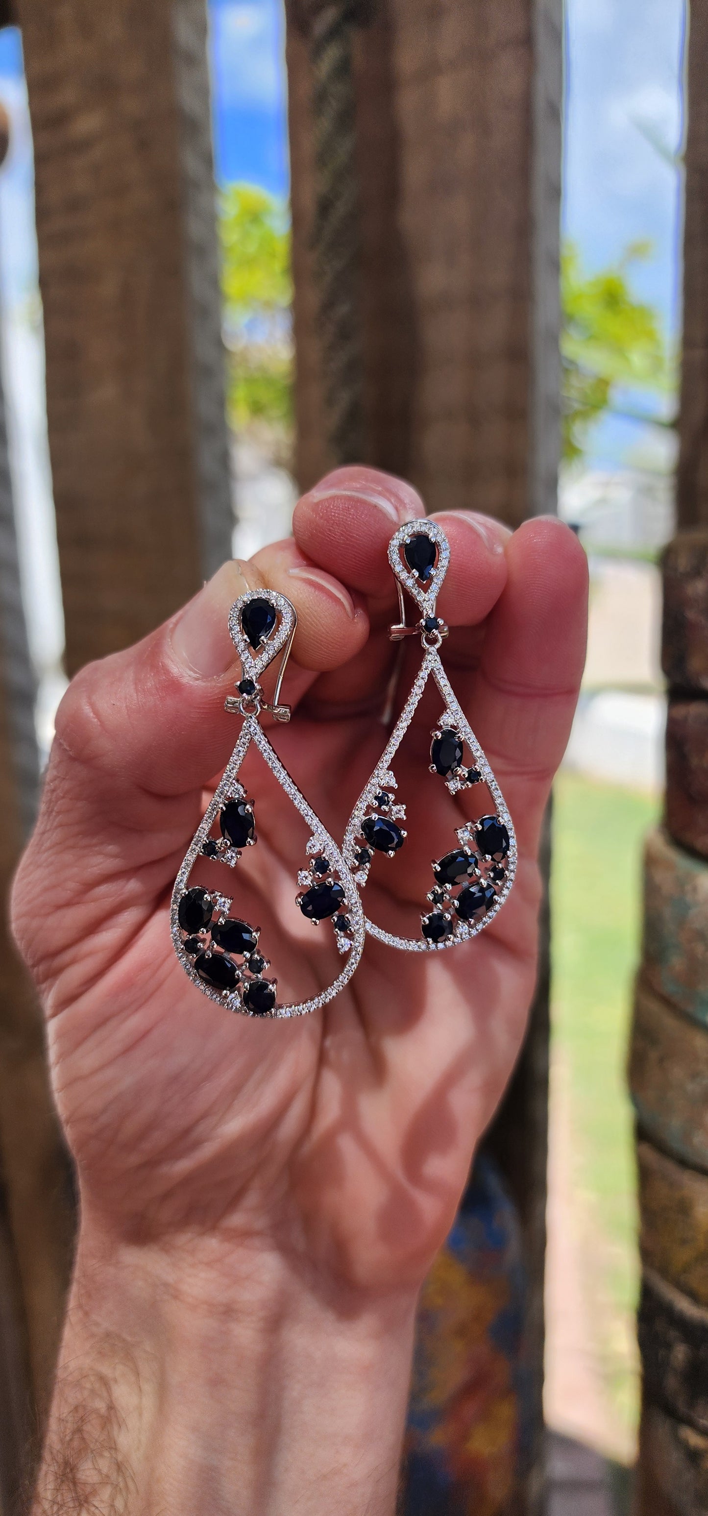 These generous in size sterling silver push-in earrings are showstoppers, dripping with opulence and bold sophistication.