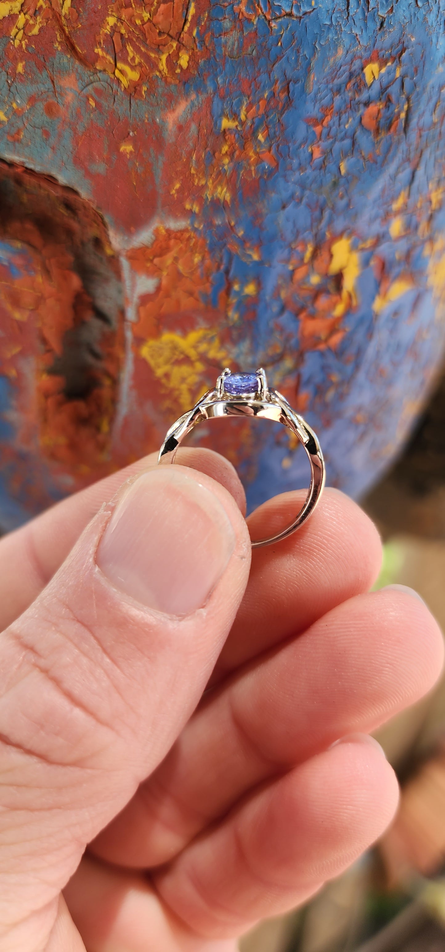 Romantic Sterling silver and Tanzanite infinty love knot ring.