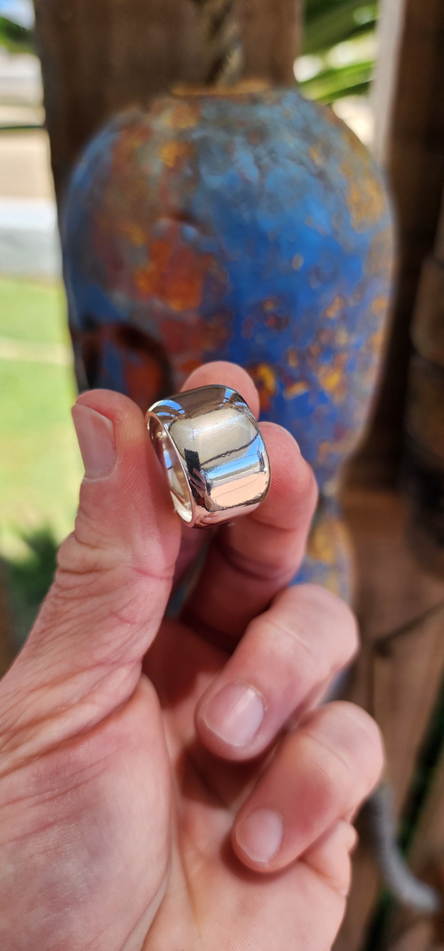 Chunky unisex sterling silver statement ring.
The design is a classic domed band, with a slight outward curve across its surface, adding dimension and a soft, rounded profile.