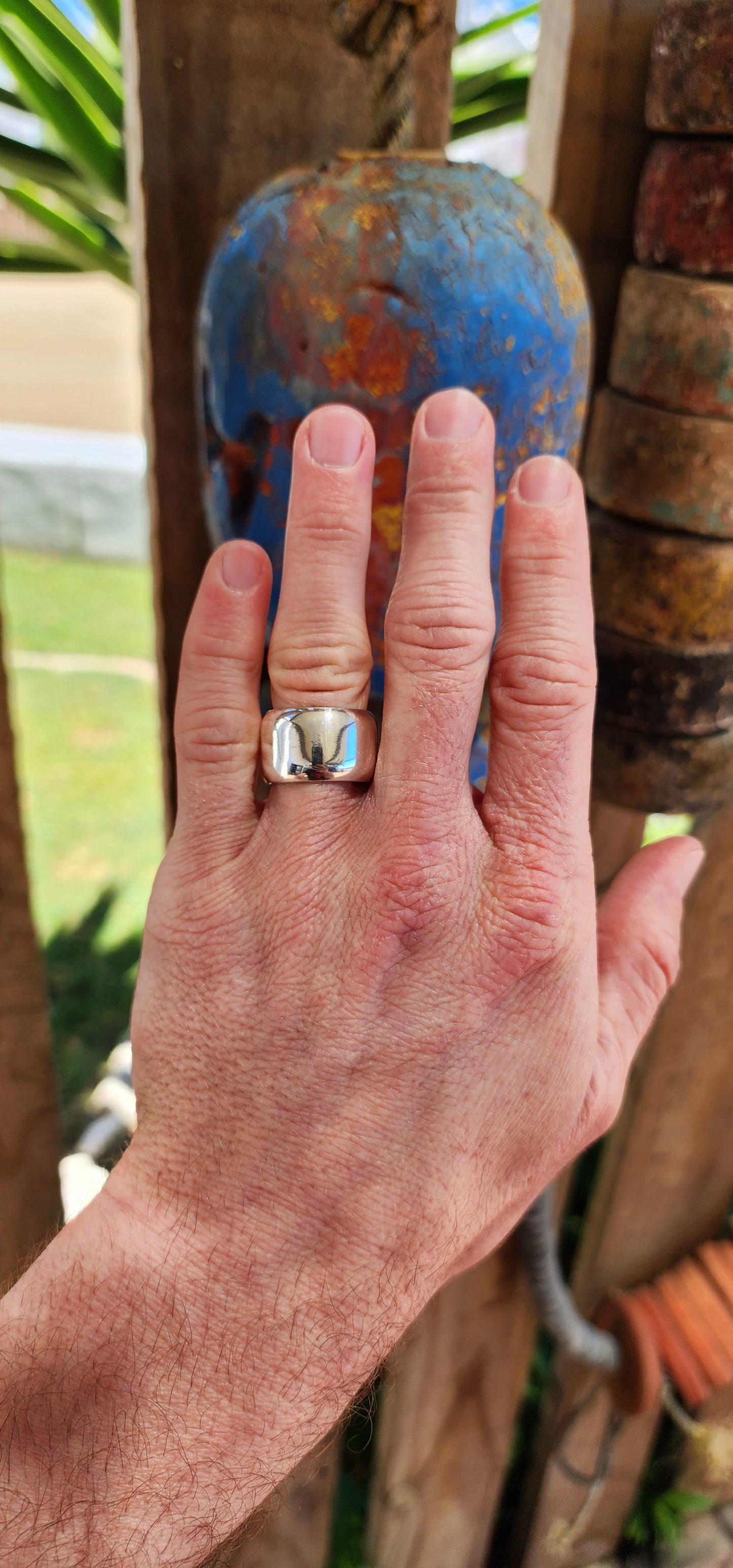 Chunky unisex sterling silver statement ring.
The design is a classic domed band, with a slight outward curve across its surface, adding dimension and a soft, rounded profile.