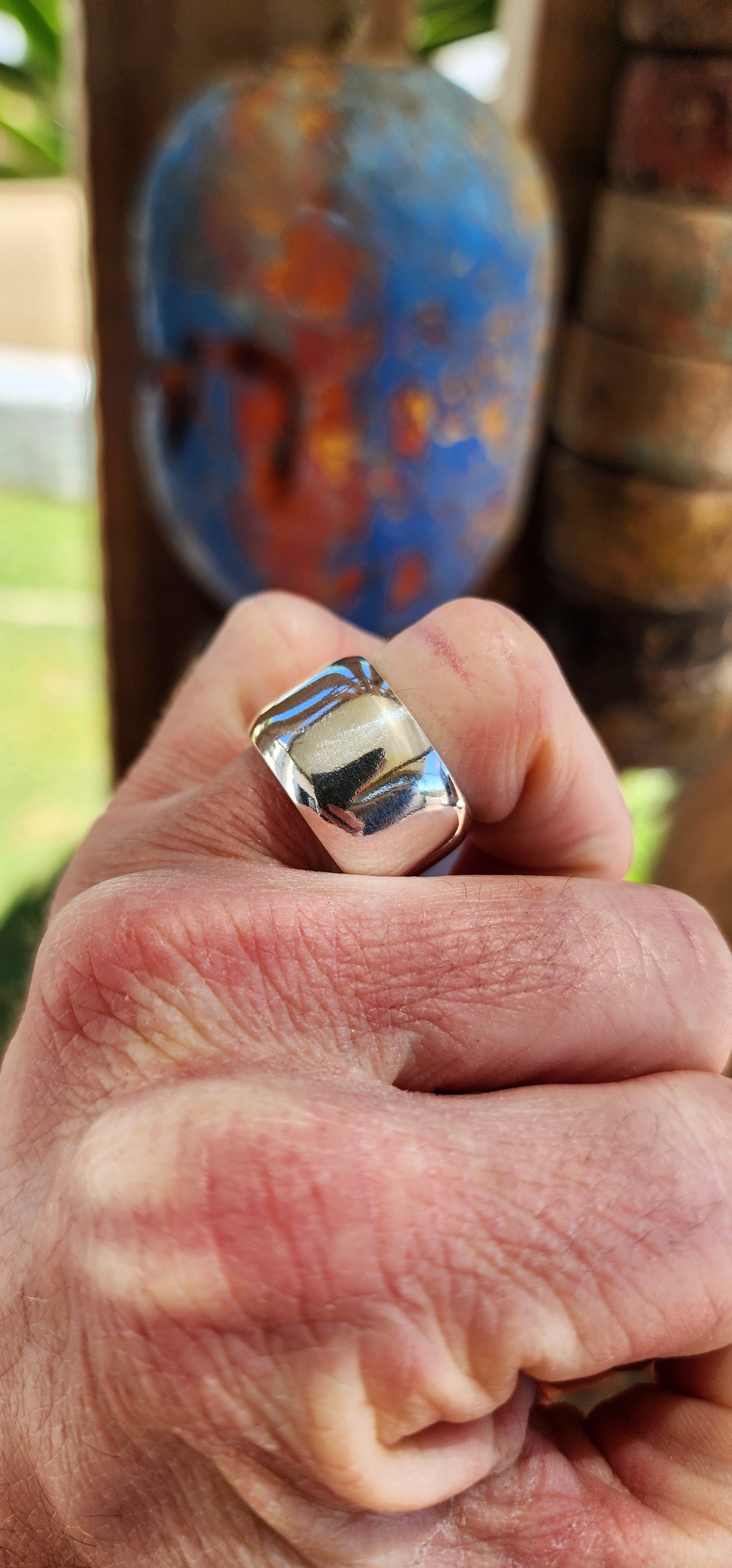 Chunky unisex sterling silver statement ring.
The design is a classic domed band, with a slight outward curve across its surface, adding dimension and a soft, rounded profile.