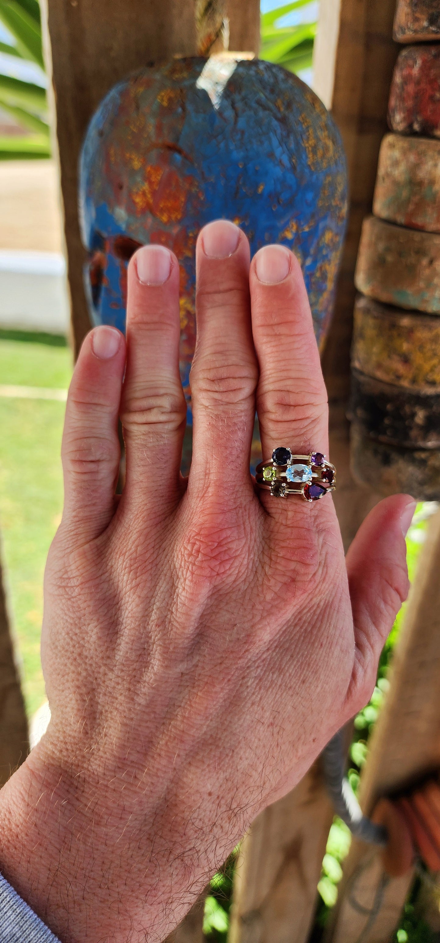 This chunky sterling silver beauty is like a rainbow party for your finger! Sporting a delicious "tutti frutti" lineup of gems, it’s a gemstone extravaganza with prong-set Iolite, Amethyst, Peridot, Topaz, Smoky Quartz, and fiery Garnets.