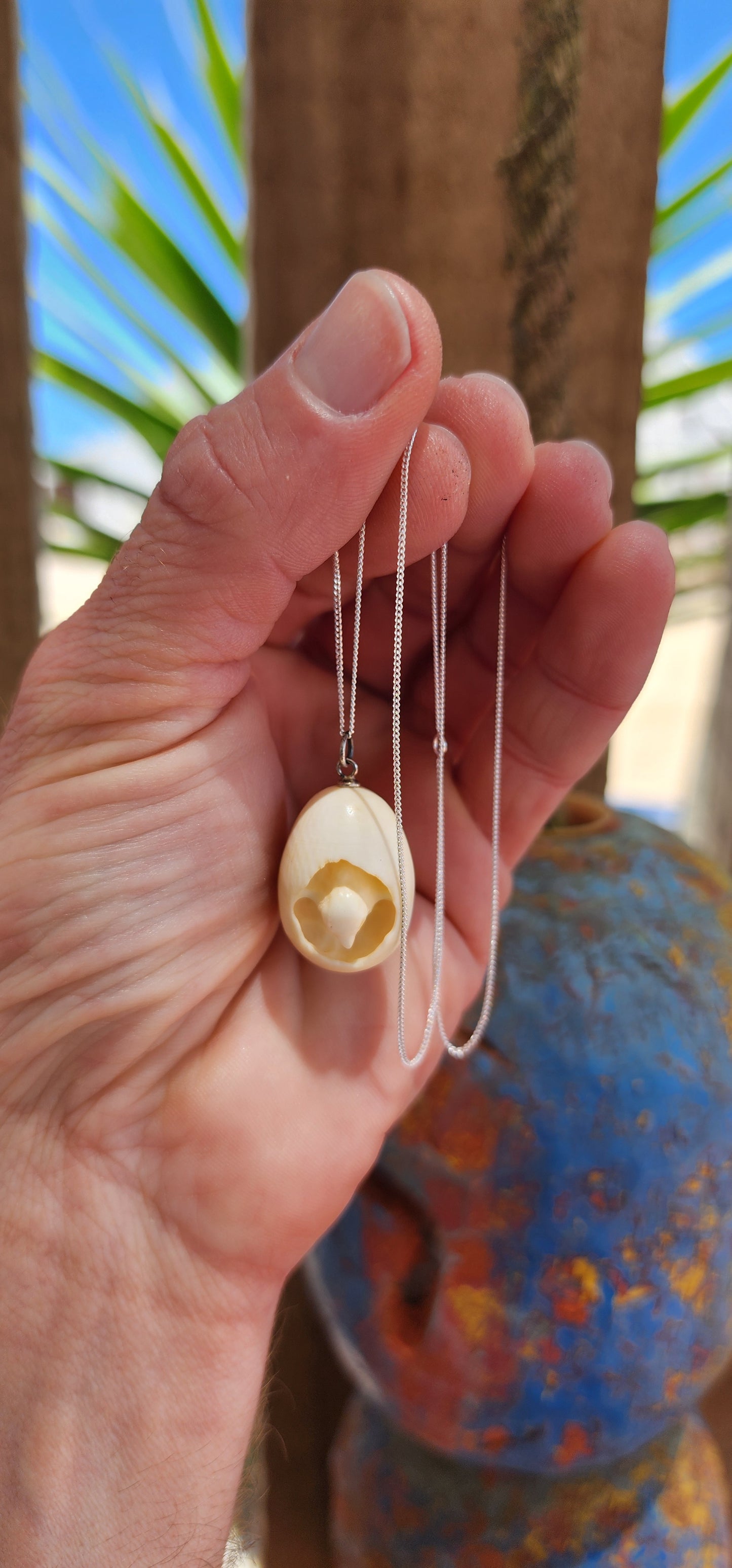 How adorable and truly unique!
This pendant is an exquisite example of Victorian-era craftsmanship and artistry, delicately carved from pre-ban ivory.