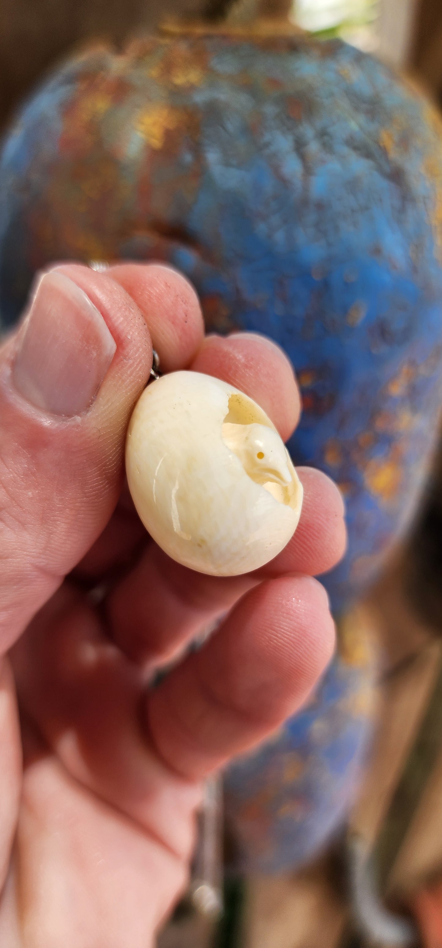 How adorable and truly unique!
This pendant is an exquisite example of Victorian-era craftsmanship and artistry, delicately carved from pre-ban ivory.