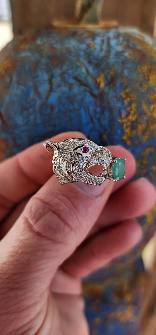 This ring is nothing short of a statement piece-a dazzling roar of glamour and ferocity that wraps around your finger with unapologetic boldness! Designed as a regal tiger's head, it exudes power and mystique.