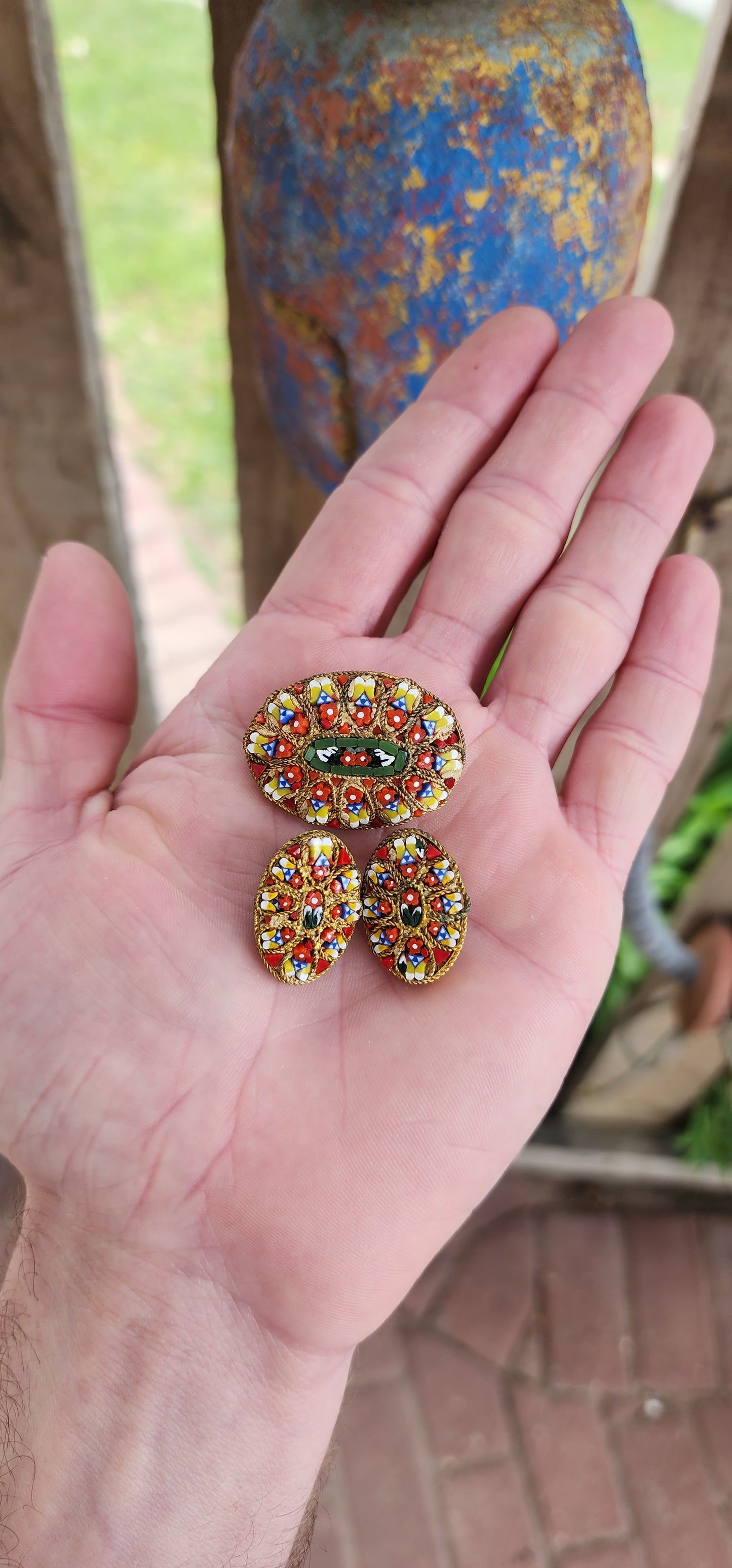 Beautiful vintage circa 1960's Italian micromosaic jewelry, consisting of an oval brooch and matching clip-on earrings.