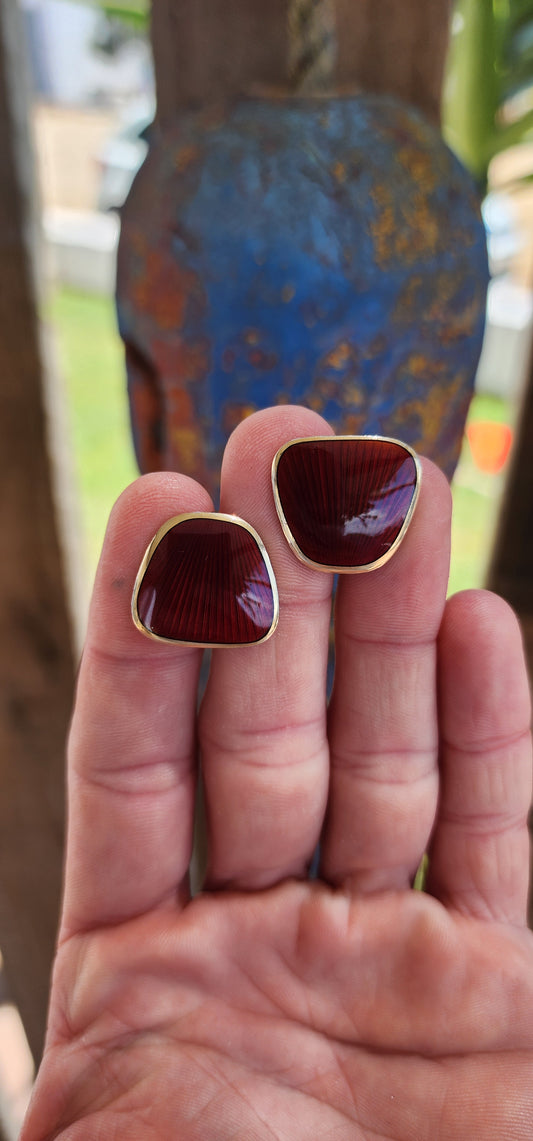 These striking cufflinks are a quintessential representation of the mid-century Scandinavian modernist aesthetic, crafted in the 1960s by the celebrated Norwegian silversmith Finn Jensen.