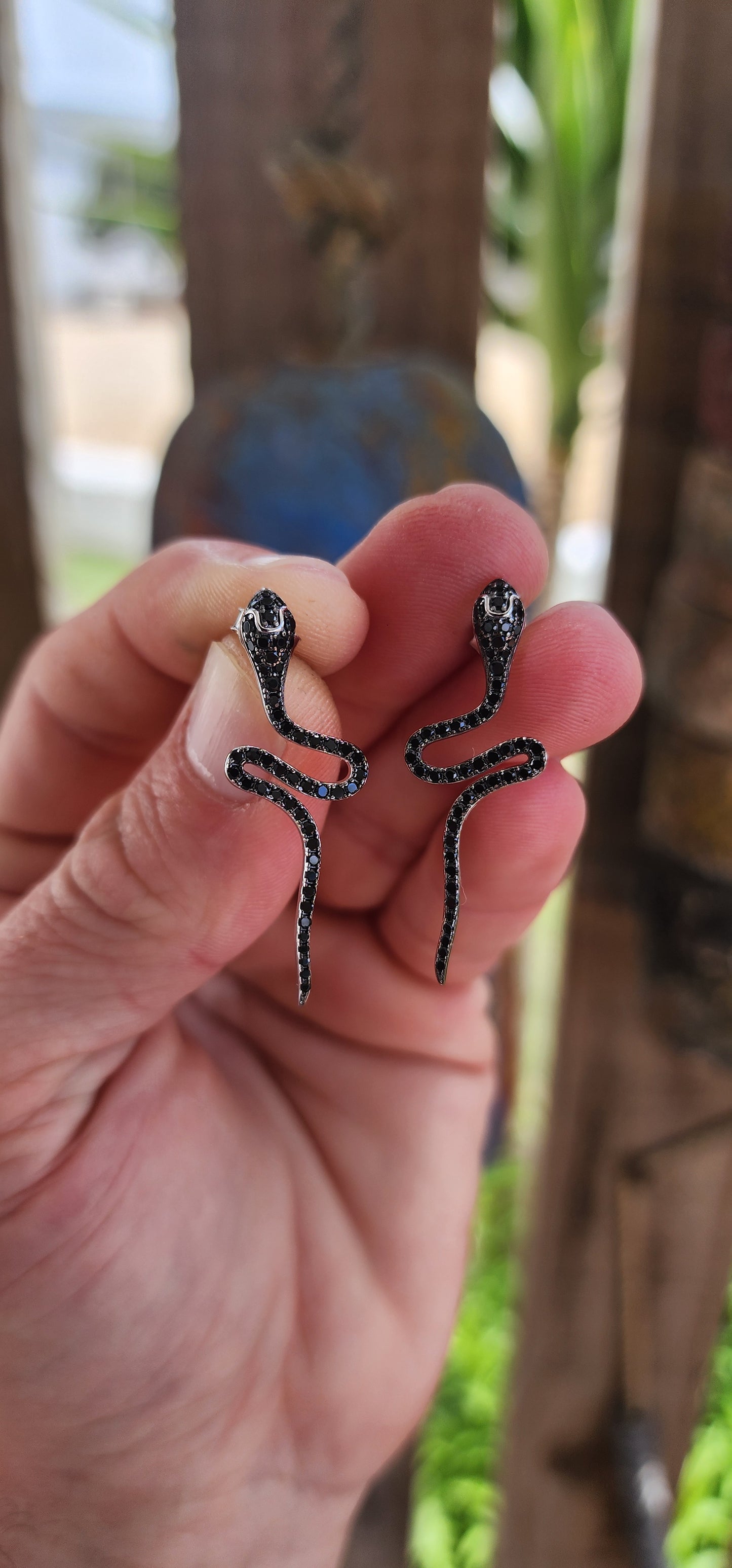 These sterling silver serpent earrings are the ultimate mix of glam and edge—like having two dazzling snake companions whisper secrets into your ears.