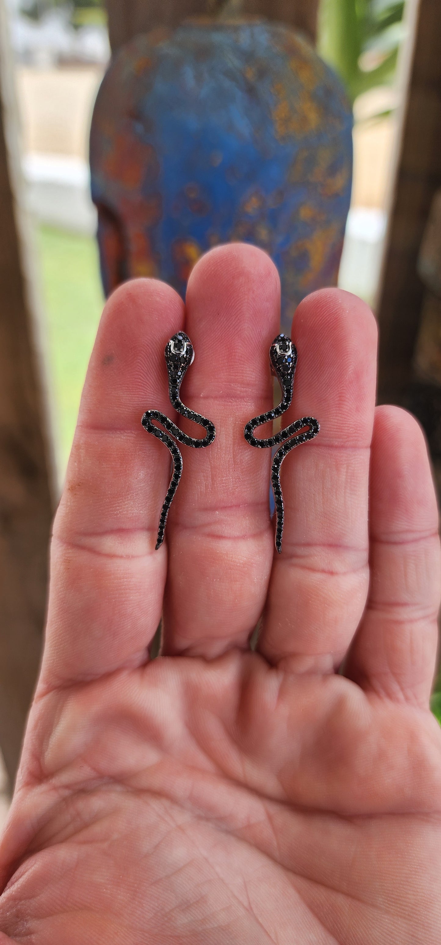 These sterling silver serpent earrings are the ultimate mix of glam and edge—like having two dazzling snake companions whisper secrets into your ears.