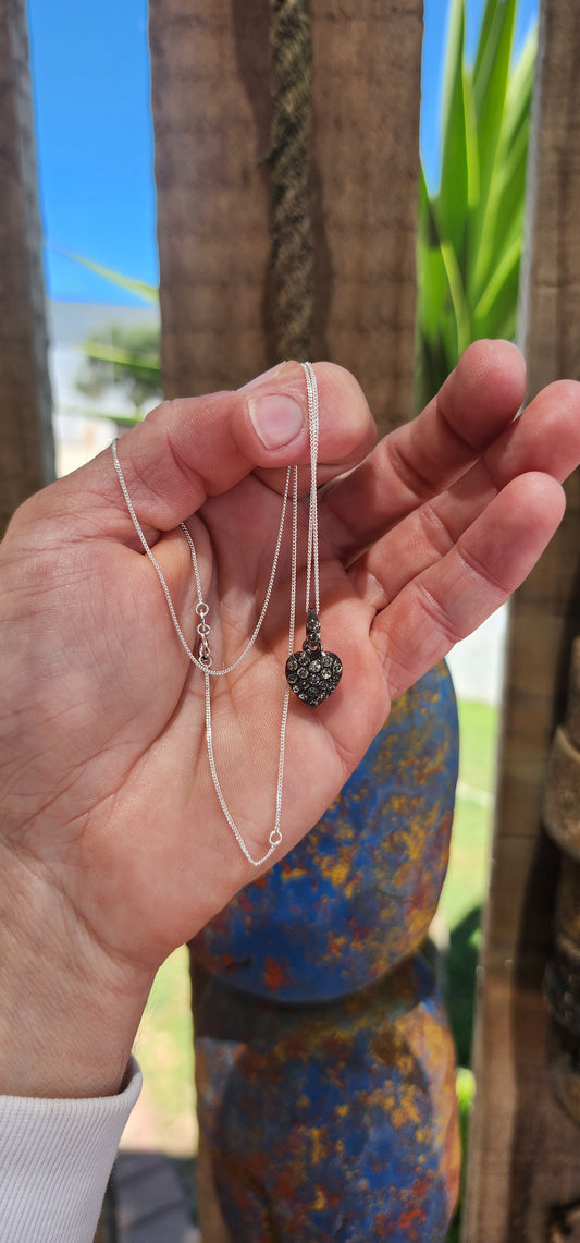 Rare find!!!This petite antique Victorian puffed heart pendant, dating to the 1870s, is a fine example of French craftsmanship from the era.