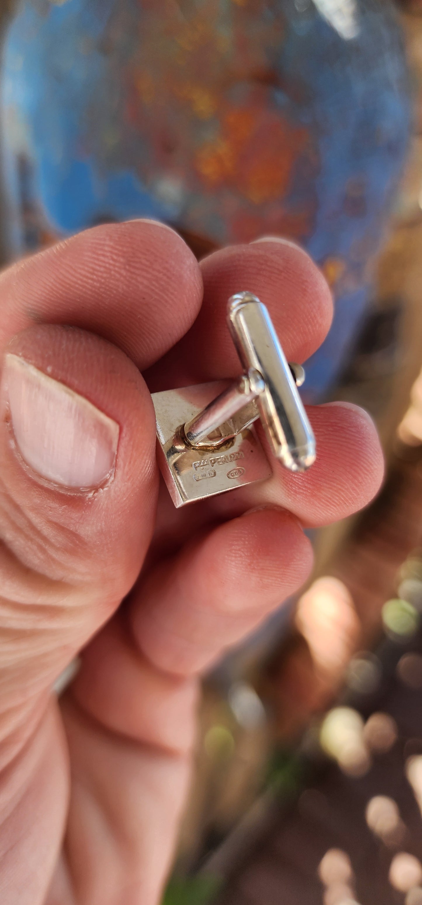 These designer Fratelli Peruzzi sterling silver cufflinks, titled "Lily Gemini," are an exquisite representation of Italian craftsmanship and timeless elegance.