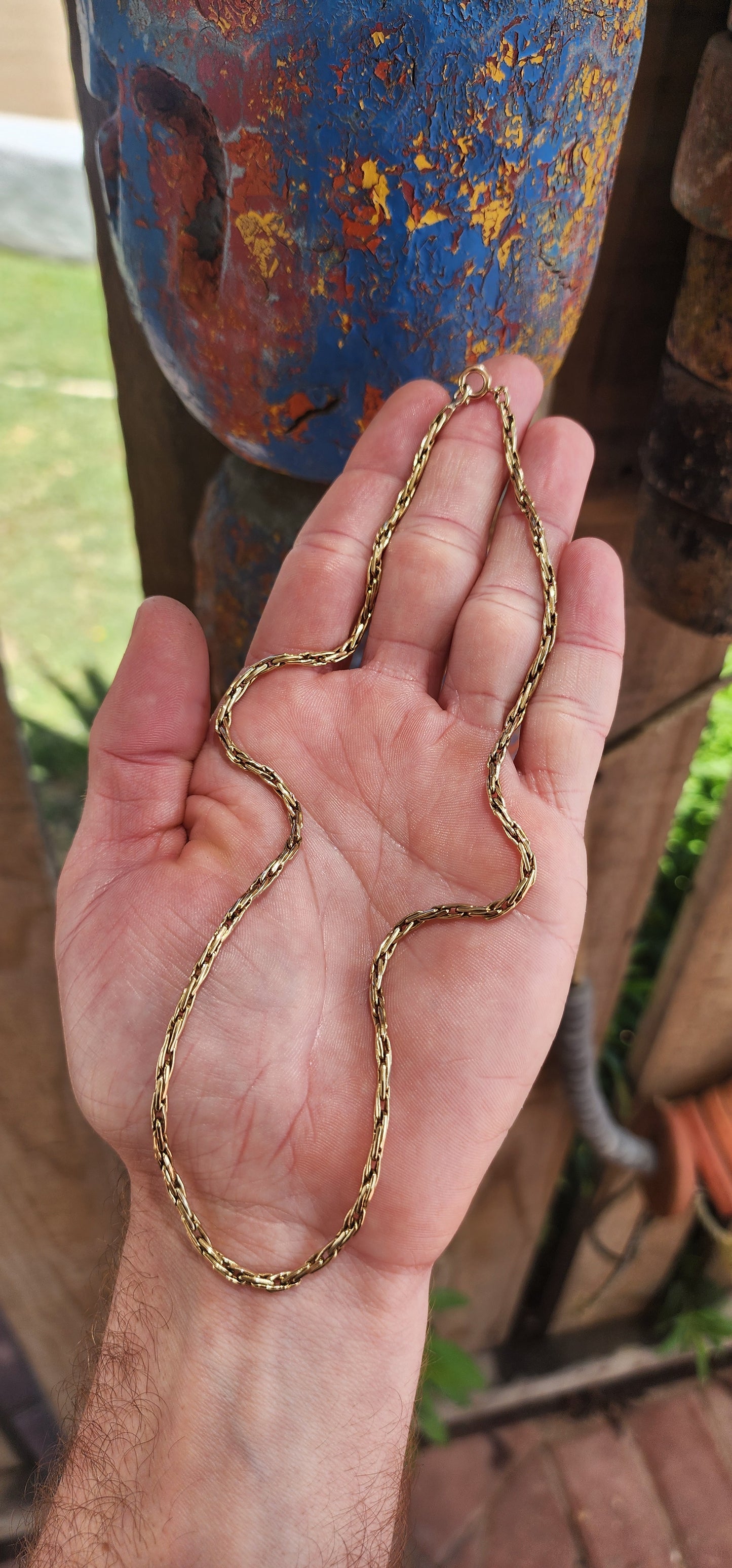 This vintage 9ct yellow gold fancy wheat link chain necklace is a timeless piece of exceptional craftsmanship.