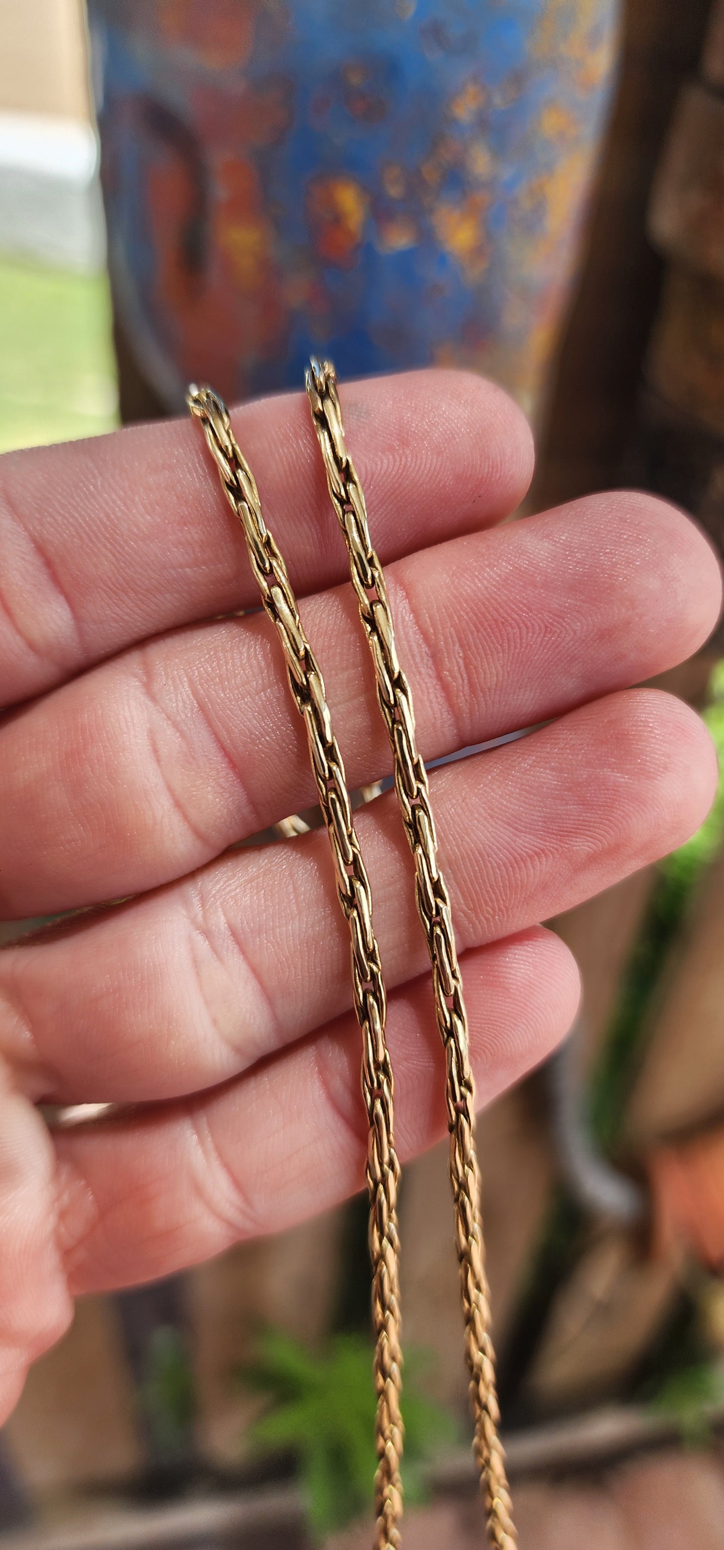 This vintage 9ct yellow gold fancy wheat link chain necklace is a timeless piece of exceptional craftsmanship.