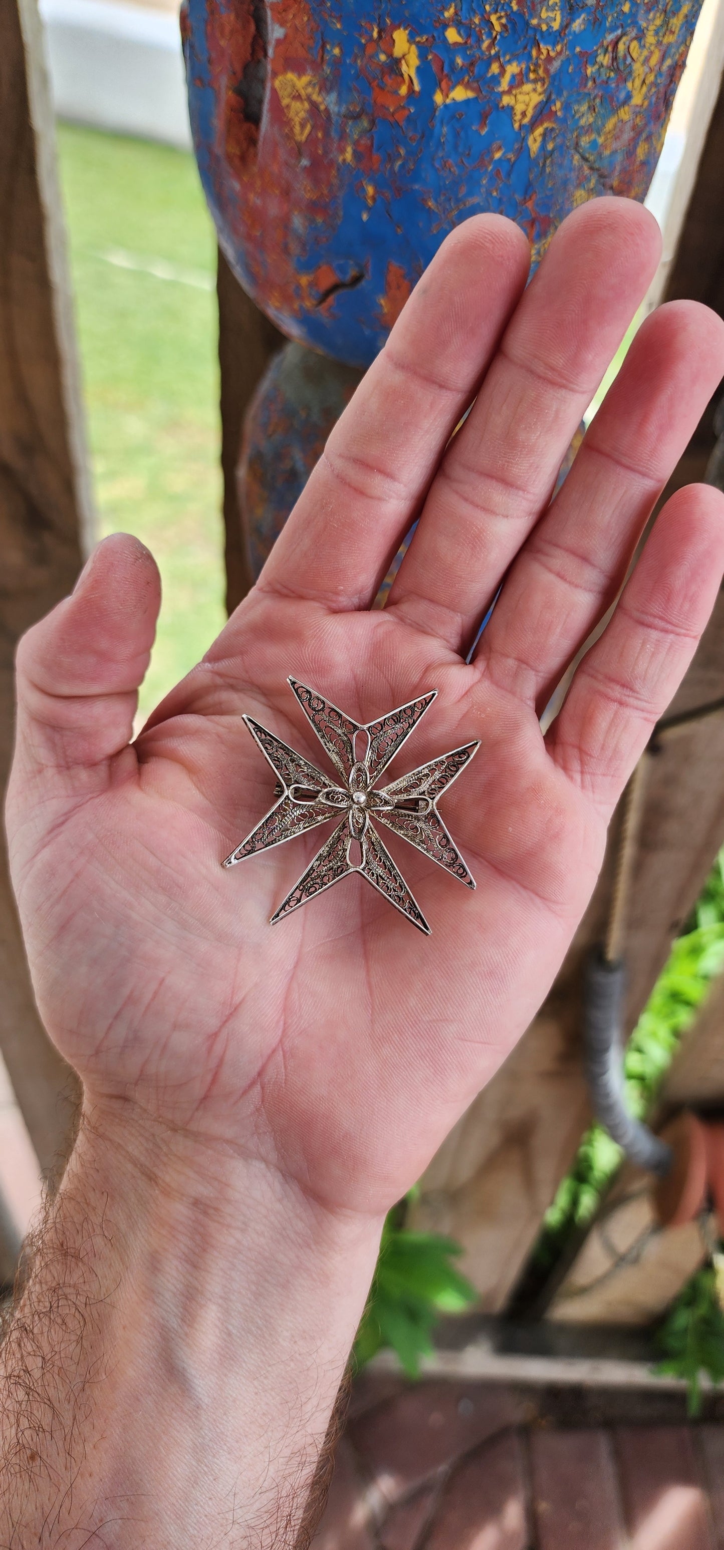 This vintage 800 silver Maltese cross brooch is a remarkable example of traditional Mediterranean jewelry-making, embodying both historical significance and exceptional craftsmanship.