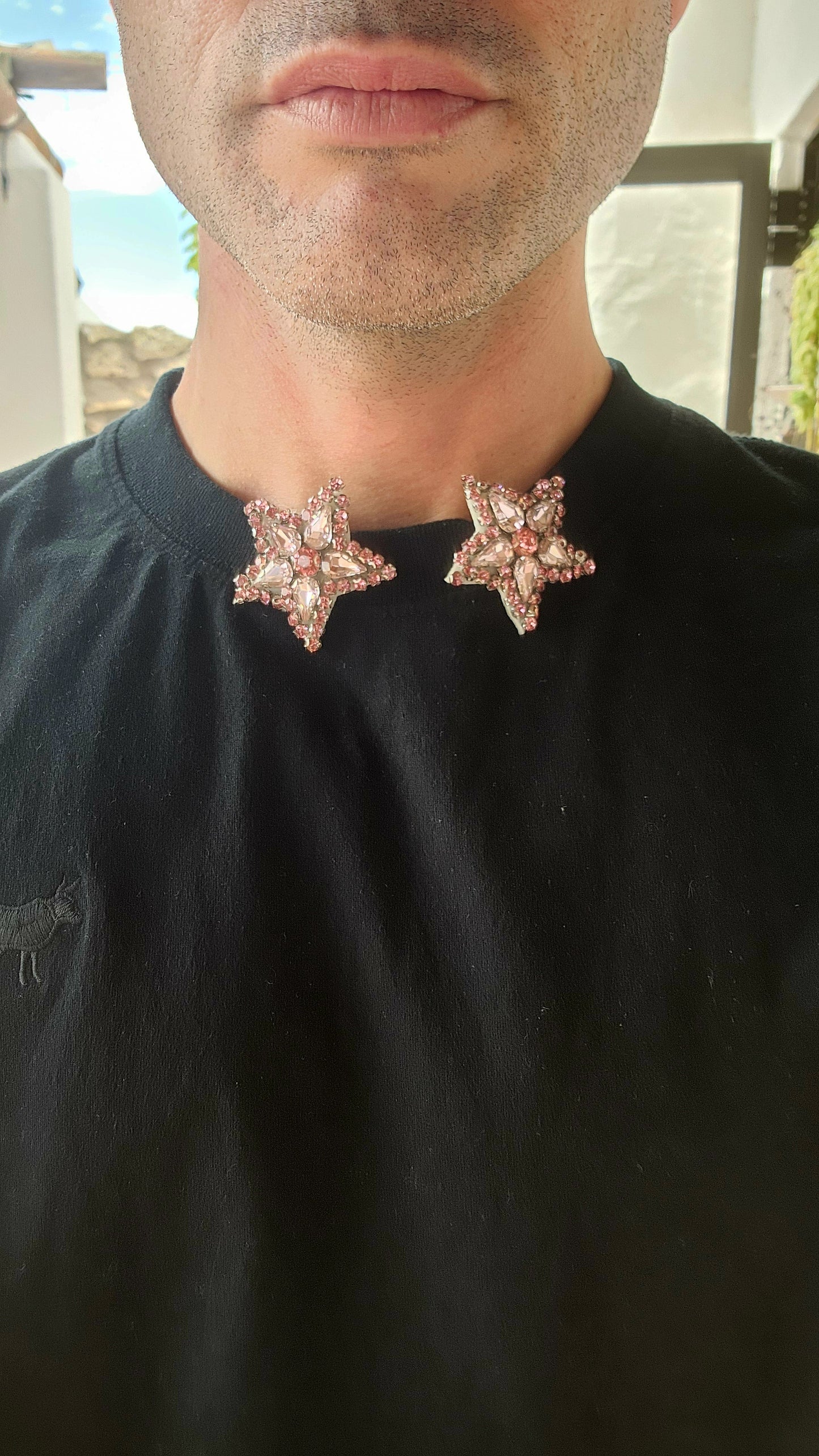 These are fabulous handmade star shaped dress clips that are equal parts dramatic and versatile. Each clip is designed in a bold starburst pattern, featuring a dazzling mix of pink glass rhinestones.