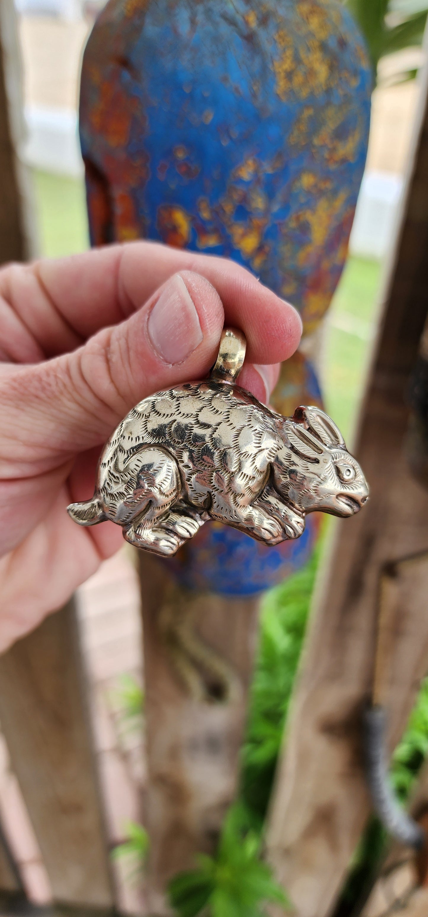 This remarkable vintage pendant is an extraordinary piece of craftsmanship, steeped in symbolism and rich in artistry. Its design captures the spirit of the hare, a revered creature in folklore and mythology across cultures.