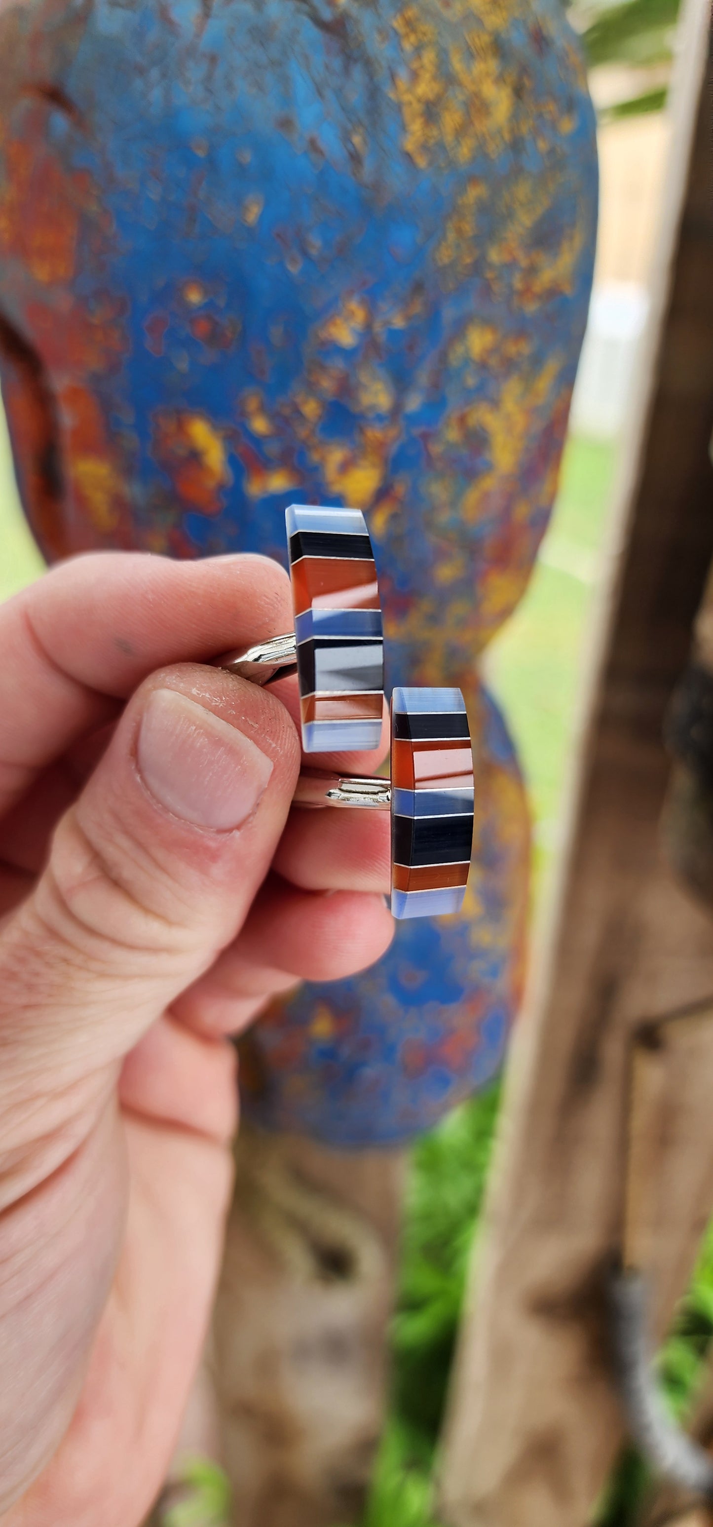 Two pairs of stainless steel and glass components cufflinks, elegantly designed in a art deco style.